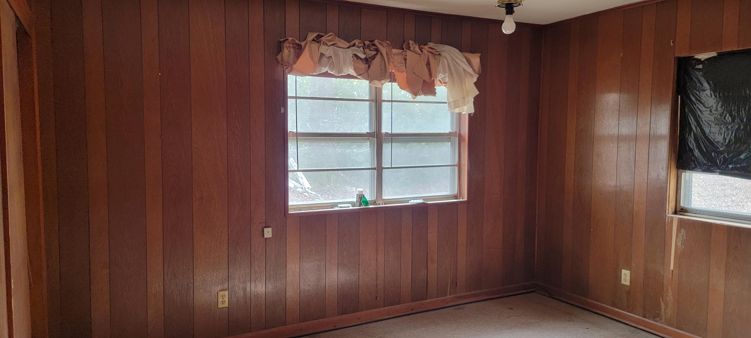 This will be a great little home with some TLC.  It appears to have good bones with the concrete block construction and metal roof. Large lot gives you plenty of room for outdoor projects. Room dimensions and pictures to be added