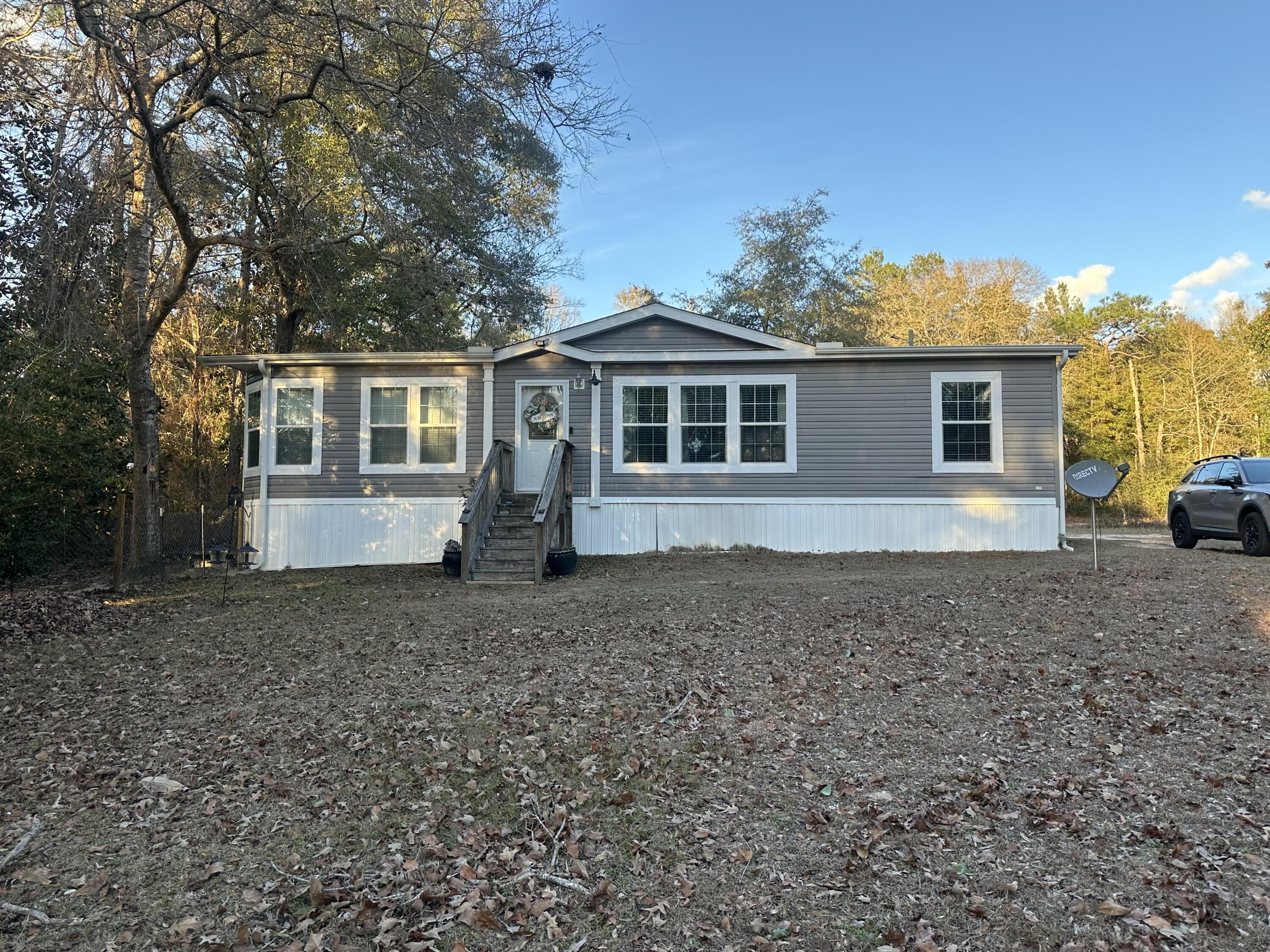 Have you been looking for a quiet get away on the lake? Well, this might be the property for you. This beautiful, manufactured home located just north of DeFuniak Springs on Kings Lake. The home is 3/2 and features a large living room area, perfect for entertaining guest. The HVAC was recently replaced and is less than a year old. The best part of this property is the gorgeous view of the lake. With approx. 85-100 feet of lake frontage featuring a private boat launch you are ready to hit the water for some prime fishing opportunities. The property is 1 acre in size and features a shed with electric and water already hooked up. This well-maintained home is move in ready and comes with refrigerator, stove/oven, and dishwasher. Come take a look and see if this home is right for you!