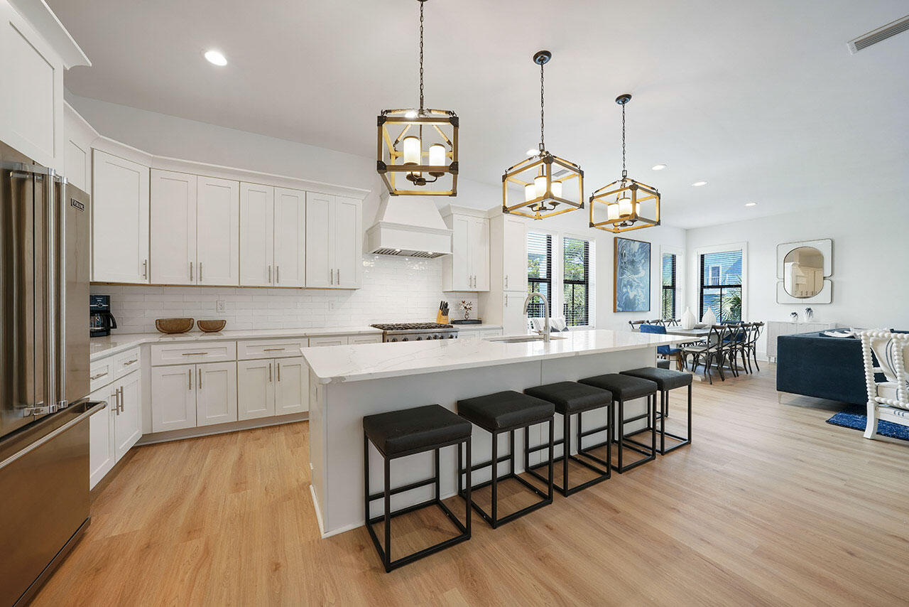Brand New Construction and sold beautifully and newly furnished. There's still plenty of time to rent out for spring/summer season.  Steps from ultra-happening Shunk Gulley restaurant and 30A's widest public beach access at Ed Walline Park. Located adjacent to Gulf Place entertainment district. Plan on monthly afternoon art walks, Saturday concerts on the lawn, leisurely dinners at renowned restaurants, and memorable shopping. Santa Rosa Golf club is a five minute drive and offers some of the area's best semi-private play. No wonder this ''has it all' home is projected to produce over $220K per year in vacation rental income. ''Let It Be'' - This newly built stunner sleeps 14 across 6 bedrooms, has a private pool that can be heated, an elevator that accesses all floors. Let It Be is located in the ideal location for your investment property and/or family compound. Covered through September 2023 under Builder Warranty. 
Sold fully furnished and rental ready, color meets classic lines in cheery décor and creates the perfect environment for relaxing while entertaining.. First floor, enjoy your own private pool, grill and al fresco dining. 
An expansive main living space is well-positioned on the second floor. Gather up around the chef's kitchen or spill on over to the comfy living area. "Let It Be" says bring the crowd on in. The inviting gourmet kitchen for the chef in the group including a high-end stainless steel Viking appliance suite with a six burner gas stove, gorgeous marble countertops and bar seating for five. The adjacent dining area has a large table for gathering with seating for up to ten. Sneak away to privacy in four additional bedrooms on the third floor

At Let It Be you'll be a two minute walk from the sugar white sands of the beach and a skip to Gulf Place center, the hub for the best shopping, dining, entertainment and art on 30A. Enjoy breakfast at Perfect Pig, experience fresh Gulf seafood at Shunk Gulley or grab a cup of coffee at Sunrise Coffee Co. and stroll through the Artists at Gulf Place and find that perfect art piece to take home! Altogether, Let It Be is the perfect house for hosting a group retreat, family vacation or lodging for a wedding party where everyone has a space to get ready.