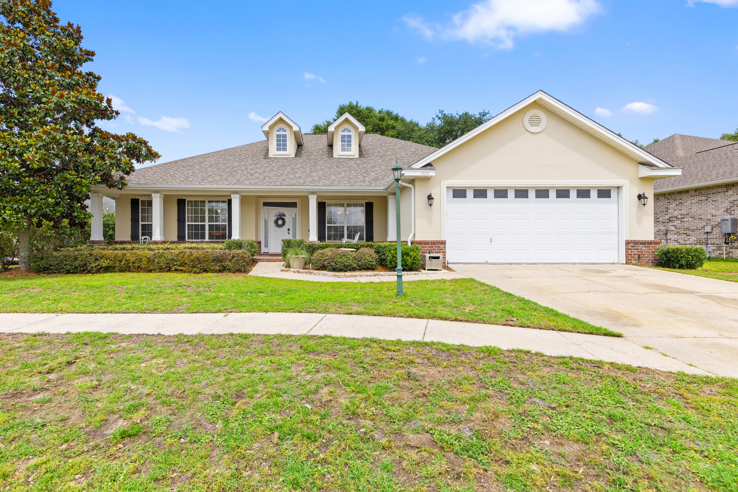 Welcome home to this impressive 4 bedroom, 3 bathroom Key Lime-built beauty in the sought-after, gated community of Chanan Estates! With 2,525 square feet of living space, this home offers elegance, comfort, and convenience at every turn.
From the moment you approach the charming front porch with swing, you'll feel right at home. Inside, you're greeted by soaring 11' trey ceilings, hardwood floors, and a welcoming foyer that opens up to a bright, open layout.
The kitchen features granite countertops, a gas range, upgraded stainless steel refrigerator, breakfast bar with pendant lighting, and plenty of space for cooking and entertaining. The adjacent living room is anchored by a cozy gas fireplace and opens directly into the sun-drenched Florida room—the perfect place to relax.
 Retreat to the main suite complete with raised ceilings, direct Florida room access, a spacious bathroom with dual vanities, jetted tub, separate shower, private water closet, and a generous walk-in closet.
The fully fenced backyard is flat and private with a large patio for entertaining, plus a fire pit.
Less than 2 miles to S Ferdon Blvd you have the benefit of serenity with easy access to shopping, dining, or traveling.

*Background, credit checks
*Pet friendly upon approval
*Move out clean fee