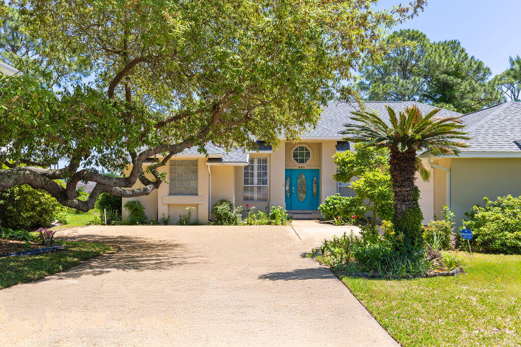Stunning Home with Gorgeous Water Views, nestled on the desirable south side of Hwy 98. This beautifully landscaped property in the charming Emerald Pointe subdivision offers deeded waterfront access to the tranquil Santa Rosa Sound. Enjoy breathtaking water views, lush greenery, and wonderful birdwatching right from your own backyard or the comfort of your sunroom. Located just a short drive from Navarre Beach's sugar-white sands, as well as Eglin AFB and Hurlburt Field, this home combines natural beauty with convenience. Inside, the chef's kitchen shines with granite counters, abundant pull-out storage, high-end stainless appliances, double drawer dishwasher, 5-burner gas stove. A separate wet bar + wine rack + built-in desk area. Enjoy 10 ft ceilings throughout and a split Floorplan. 2 year old roof! Concrete Stucco, Brazil Wood flooring, Single Slab granite countertops, Walton home Builder, Marble framed window seals/windows, 2005 Windows. The serene setting behind the home features unspoiled terrain and vibrant wildlife, offering a peaceful retreat every day. Don't miss this rare opportunity to own a slice of coastal paradise with views and wildlife that are truly out of this world! Subject to Seller credit upon acceptable offer.