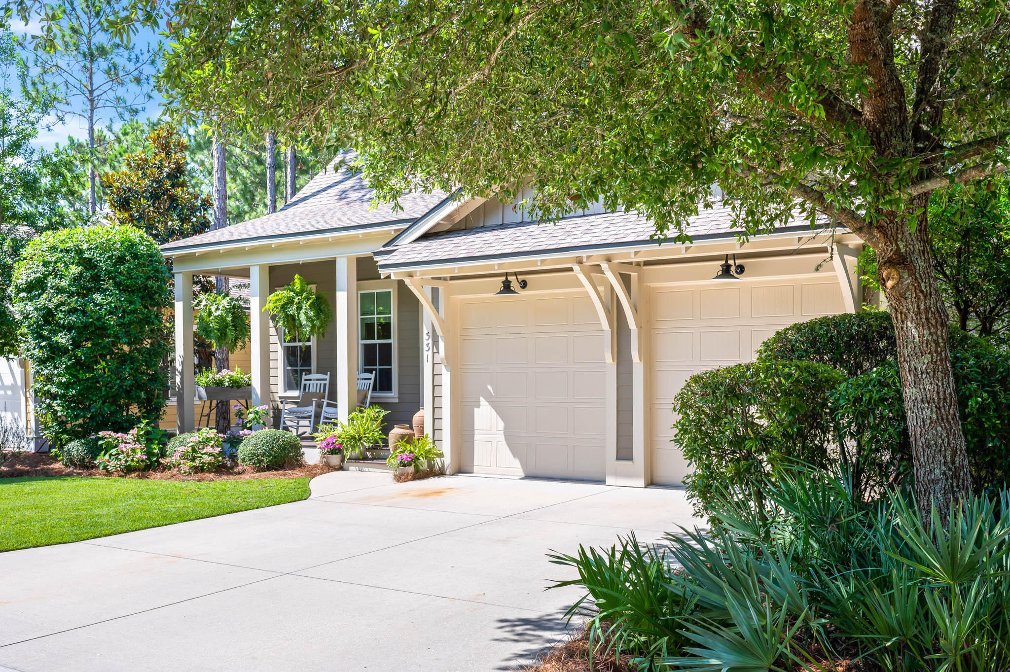 Located in the heart of Pathways in Watersound Origins, 331 Jack Knife Drive is situated on a large park within steps of community amenities. Bordered by a private walking trail, this home offers seclusion rarely found in Watersound Origins. Recently renovated, this home features new hardwood floors, quartz countertops, stainless steel appliances, custom cabinetry, designer tile and custom light fixtures. The tremendous outdoor space is highlighted by the spacious screened porch, gas fire-pit and professionally landscaped yard. 

The over-sized master suite is located on the main level and is highlighted by a sizeable garden tub, spacious walk-in shower, large double vanity and huge custom closet. Also found on the ground level is the first guest room with en-suite bath. The large laundry  and powder bath are also found on this level. 

On the second level, the additional two guest bedrooms provide ample storage with large closets and dual-vanity bathrooms. 

WaterSound Origins provides residents with an impressive collection of amenities including the Village Commons pools and fitness center, tennis courts, pickle ball courts, miles of nature trails, Lake Powell access, and the opportunity to join the famed WaterSound Club which offers an even larger array of exclusive amenities. Origins is also geographically poised minutes from the white sugar sand beaches and all of the world-class dining and shopping venues 30A has to offer. The WaterSound Town Center located in the front of the community hosts weekly Farmers Markets and will be the future home of a Publix in addition to shopping and dining options. Inquire today to schedule a private viewing and start living the coastal lifestyle you deserve.