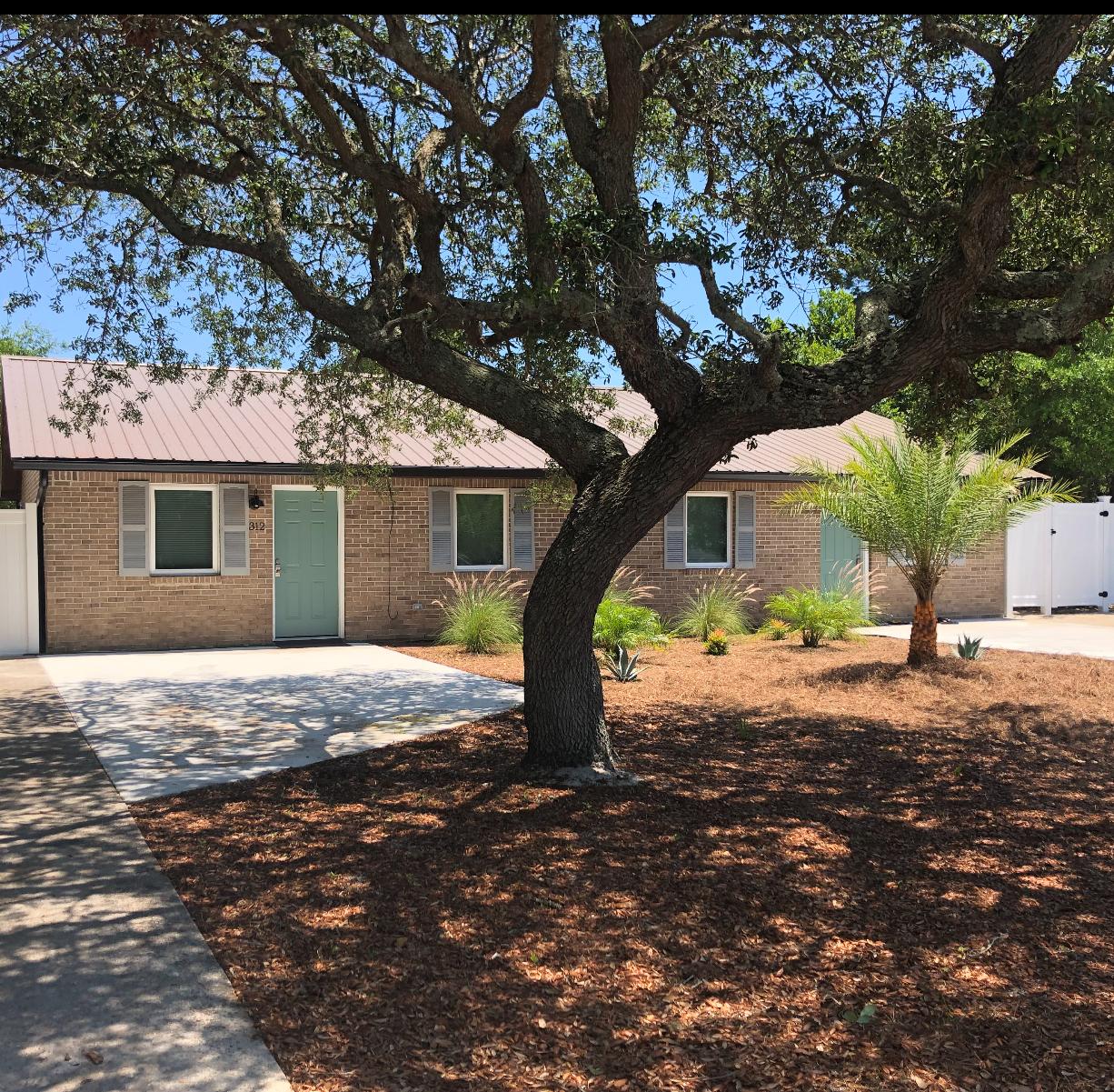 Investors Dream - Two unit updated DUPLEX in the heart of Destin. 
Maintenance free brick exterior and vinyl fence in the back yard.  Once you enter you will be greeted the beautifully renovated contemporary  farm house style interiors.  Ideal property for either long term rental cash flow or live in one unit and rent the other to cover the mortgage payment.  Significant upgrades in finishes and all new windows and doors.    Two security cameras with internet access both front and back of the house.  New water heaters installed in 2020.  Metal roof is 6 years old. ( Washer/ Dryer and Refrigerator are not included in the listing price.)  Property buyer must verify all information provided is accurate and correct.