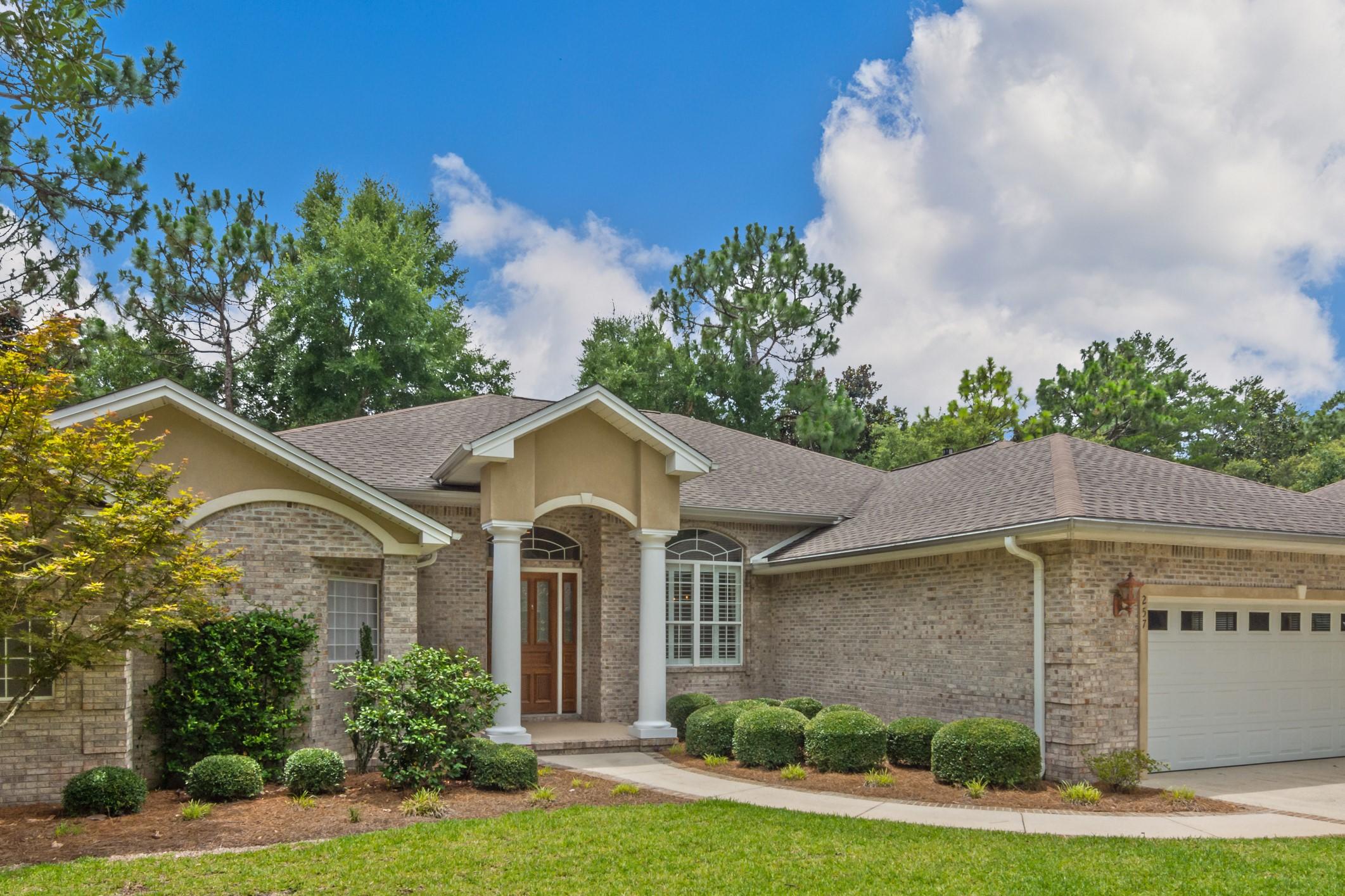 BACK ON THE MARKET & BRAND NEW ROOF!  Exquisite, custom built Gaskell Construction model home in the coveted Swift Creek subdivision, ideally located just steps away from the community clubhouse, pool and tennis courts. This home is nestled in beautiful natural surroundings, offering greater privacy. The home boasts the ideal split floor plan with exceptionally large living/entertaining spaces. The enclosed & screened-in porch provides additional entertaining/living space. Everything in this home is ''over sized,'' from the garage with commercial pull-down stairs, soaring 12 foot ceilings, ginormous master suite, family room, to the very large porch. Too many upgrades/details to list. BOTTOM LINE: Call today for your private showing of this majestic home.