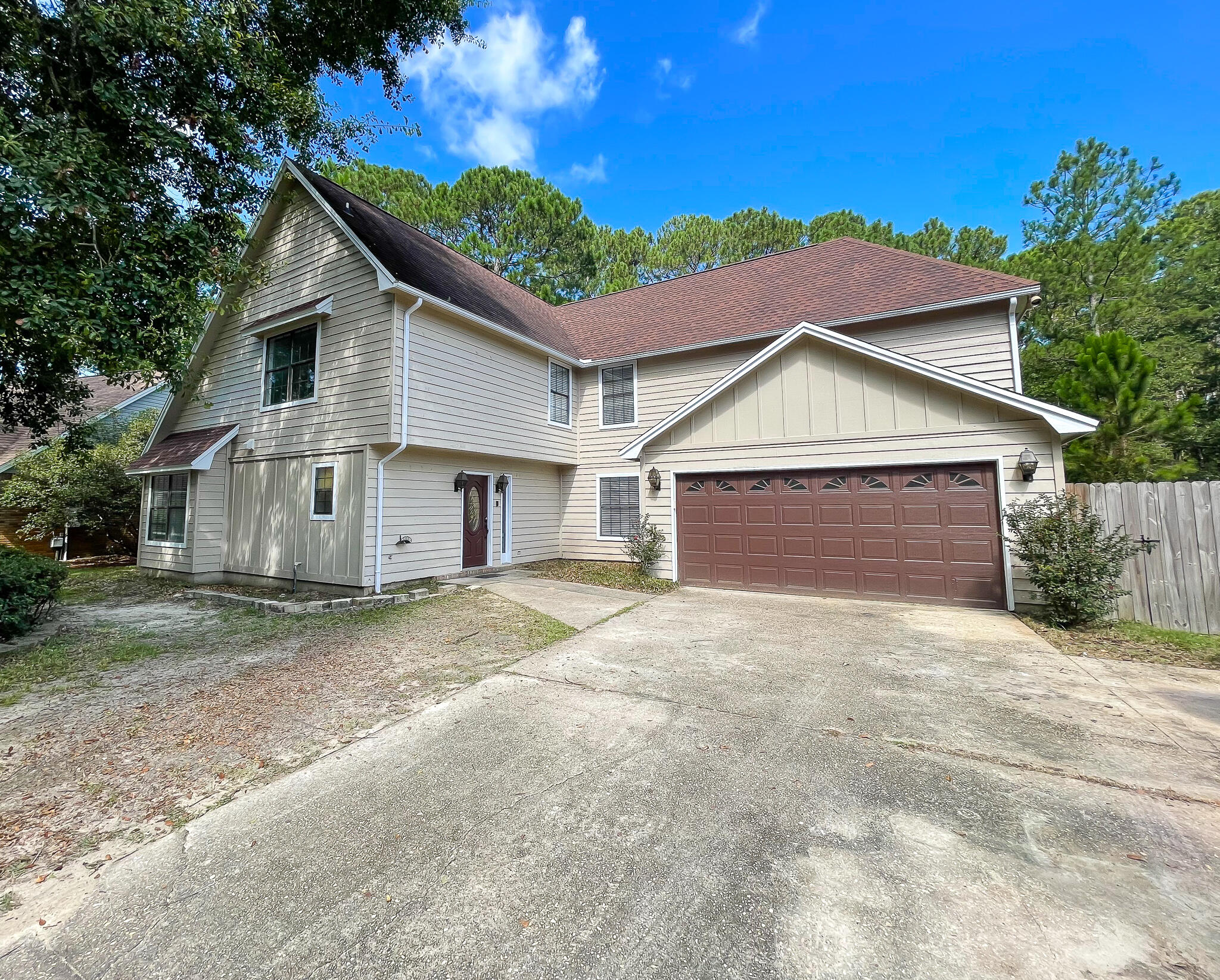 Welcome home to this custom built 2 story home on a large lot in Bluewater Bay.  This home features several different living areas on the main floor to include the kitchen, dining room, family room and separate living room. The kitchen features a plethora of cabinets as well as a built in study area. The upstairs has 4 bedrooms (2 of which have their own walk outs to the deck) and 2 bathrooms.  The master bath features a large jacuzzi style garden tub, an oversized walk-in shower, dual vanities, and plenty of storage.  Home  has also been updated with modern fixtures, vanities, appliances, granite countertops and solid surface flooring. The huge backyard is privacy fenced and includes an irrigation system to help your yard in good shape all year round.  Come see this home today