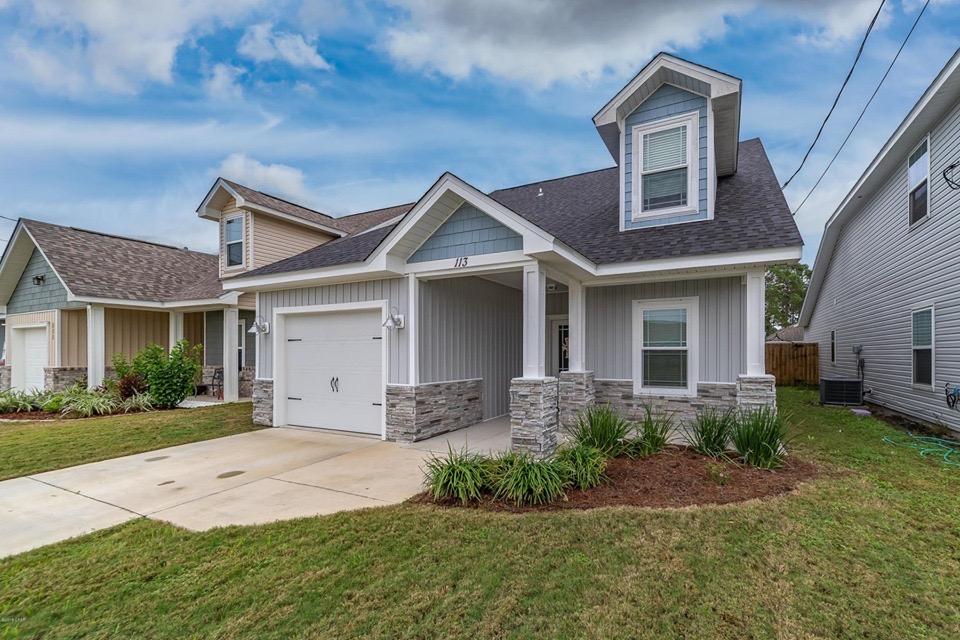 Beautiful, spacious, well maintained 5 bedroom, 3 bath home on Panama City Beach. Located close to Hutchison Blvd and Fernwood Street. Five minute drive to Pier Park. This house was built in 2016 and is walking distance to the sandy beach. Lots of natural light. Featuring 9' ceilings, stainless steel appliances, granite counter tops, raised vanities, a downstairs master suite with his and hers closets. Four bedrooms and two full baths upstairs.