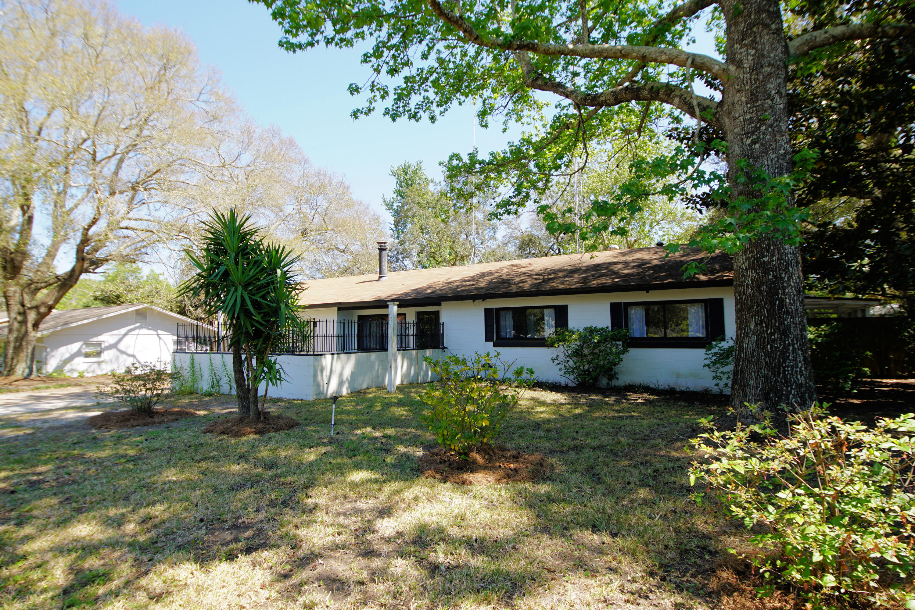 Home in perfect West Destin location just minutes from beautiful Gulf of Mexico beaches, Joe's Bayou boat launch, Destin Elementary School and ballpark. Nearby Harborwalk features restaurants, shopping, and fishing charters on Destin Harbor. Large 1/3 acre shaded yard and plenty of parking space for vehicles and vessels. Tile flooring in open kitchen with breakfast bar as well as dining and living area which features a gas fireplace. Gas stove/oven, water heater and heat. Huge 27'X17' family room with cathedral ceiling along back of home leads to 32'X12' screened back deck overlooking privacy fenced back yard. New HVAC installed two years ago and home has been rewired with copper wire in March 2019. You will love the grapefruit, satsuma, lemon and lime citrus trees.