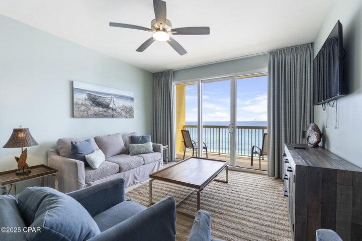 Perfect 7th-floor elevation with easy elevator access and fantastic rental history. This fully furnished Gulf-front condo offers stunning views and lives like a beach house in the sky. The efficient 2 Bed + Bunk / 2 Bath layout lives and rents like a true 3-bedroom. Open floor plan with 9' ceilings and large sliding doors showcases breathtaking Gulf and sunset views from the living room, kitchen, dining area, and master suite. The spacious balcony is perfect for outdoor living and entertaining. Turnkey and rental ready with coastal décor, ceramic tile in the kitchen, and LVP throughout living and bedroom areas. The kitchen features stainless steel appliances and ample storage.