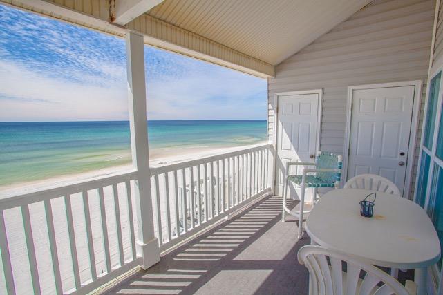 This is a rare opportunity to own a 3 bedroom, 3 bath, gulf front condo with a garage in the quiet gated community of Sugar Dunes. This unit has vaulted ceilings with a large open living area, a private balcony with unobstructed views of the gulf and the beach. Take a walk down the private steps onto the sugar white sandy beach.