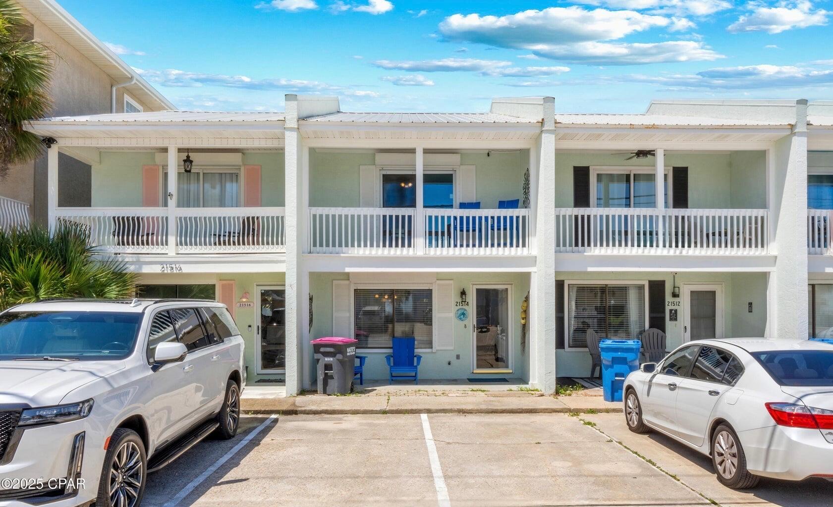 Directly across the street from the sugar-white sands of Panama City Beach, this updated Riviera Beach townhome delivers coastal convenience, investment potential, and beachside charm. Enjoy breathtaking Gulf views from the second-floor balcony and easy public beach access just steps from your front door. Inside, the home features tile flooring throughout the first floor and a spacious layout designed for comfort and low-maintenance living. The upstairs features carpeting in the bedrooms. The kitchen is equipped with granite countertops and a full appliance package, making it ideal for full-time residents or vacation rentals alike. The property is being sold turnkey—fully furnished and ready to enjoy or rent—just bring your own linens. Recent upgrades include new backyard landscaping for enhanced privacy and outdoor enjoyment, and a major utility improvementthis property is now connected to public sewer and water, offering peace of mind for future maintenance and rental value. Located on the desirable west end of the beach, you're just minutes from local favorites like Pier Park, Carillon Beach, and the 30A corridor. Dining, shopping, and entertainment options abound, making this a prime short-term rental opportunity or second home. With no HOA fees, two parking spaces, and a welcoming local community known for festive gatherings and golf cart parades, this is the ideal place to embrace the coastal lifestyle or expand your rental portfolio.