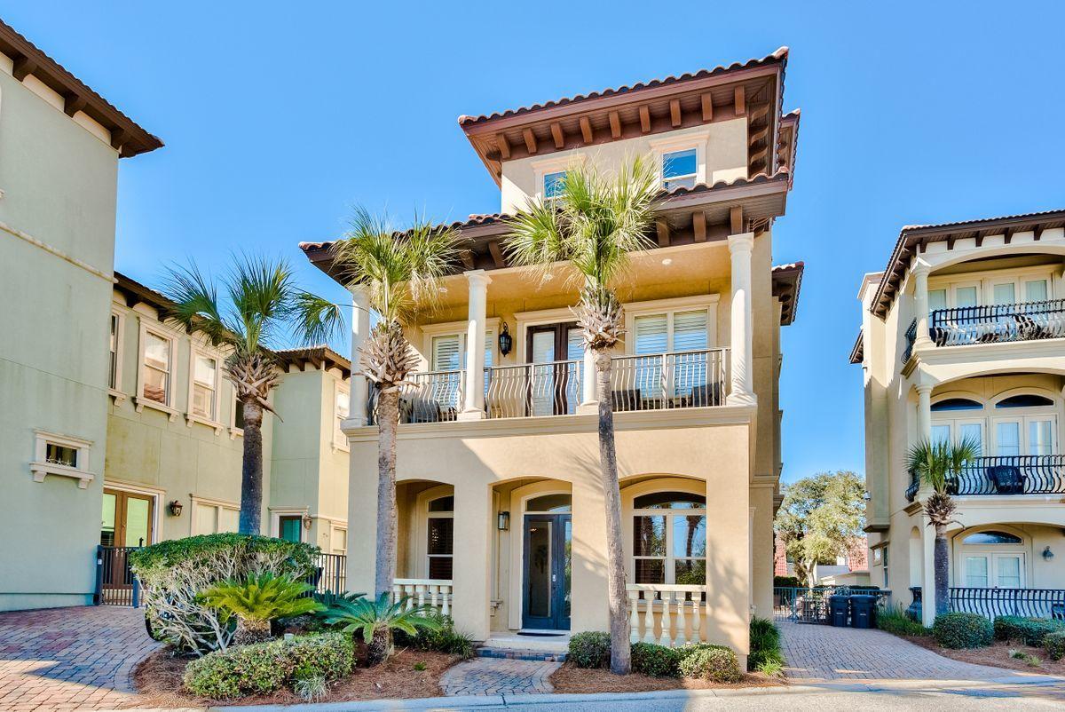 Situated three houses back from the Old Blue Mountain Beach access, this impressively designed home ticks all the boxes as a luxury beach home. Enviably-located, this three-story residence enjoys sparkling views of the Gulf of Mexico. The high interior standards are evident in the travertine and hardwood floors that add to the sense of high-end luxury.  Ample living space on the ground floor flows from the dining area through the gourmet kitchen to the al fresco dining area overlooking the pool. Four splendidly spacious bedrooms are spread over the second and third floors, with the third floor enclosed balcony creating a well-appointed dual master suite. Upscale interior features include a gas fireplace, which lends itself to cozy winter evenings. Both pool & lawn maintenance are included!