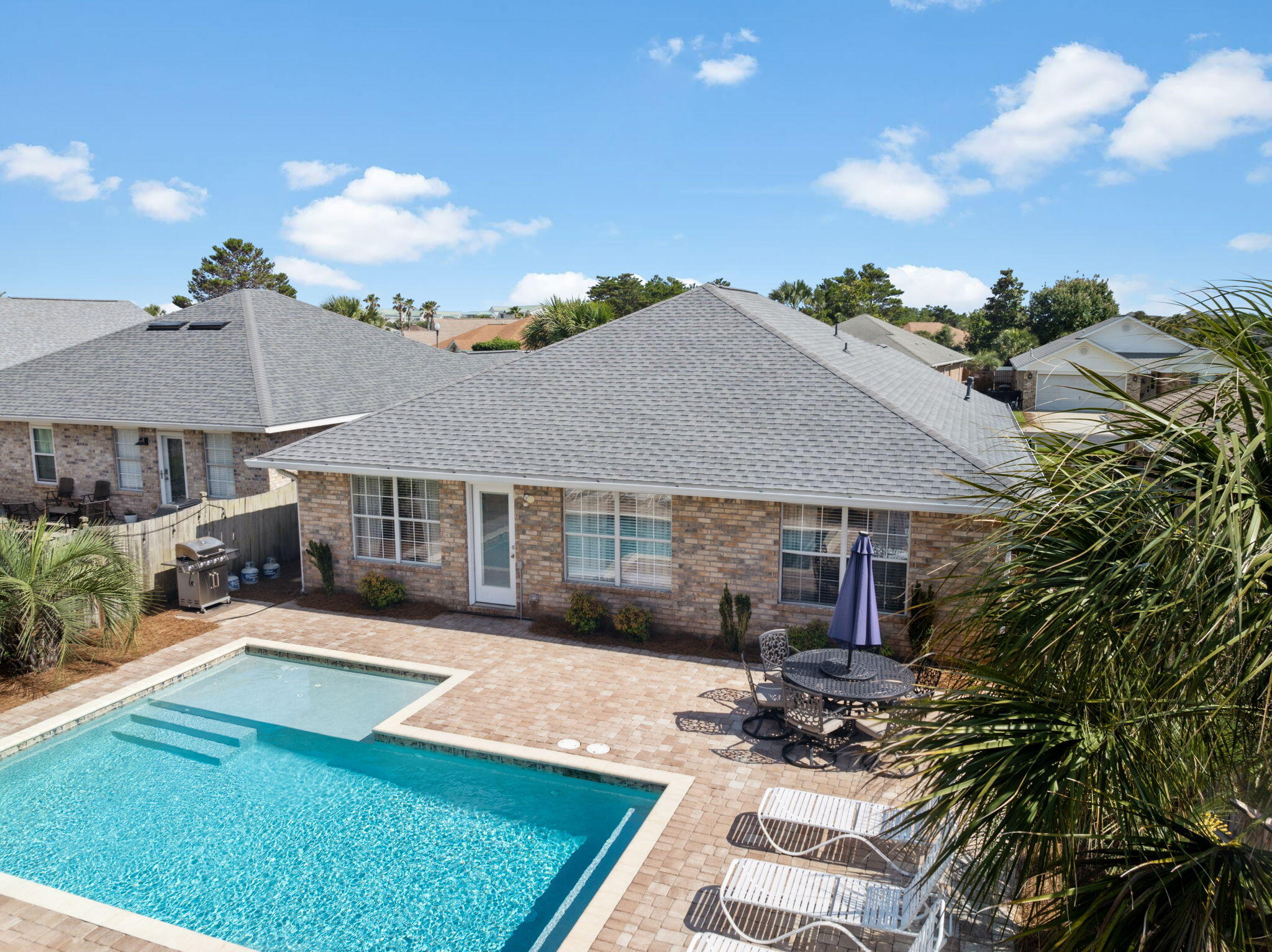 Welcome to Rustic Retreat—a proven rental powerhouse with serious income potential and charm to spare. With $126,074 in rental income for 2023 and $101,200 for 2024, plus 100 glowing five-star reviews, this fully furnished coastal gem isn't just a vacation home—it's a high-performing investment in one of the most desirable spots along the Emerald Coast.
Tucked inside the gated Paradise Retreat community, this 3-bedroom, 2-bath beach home maximizes space and style across 1,586 square feet—and comfortably sleeps up to 14 guests thanks to a smart bunk room conversion. Inside, the open floor plan flows effortlessly from a remodeled kitchen to a cozy living space ideal for relaxing or entertaining. Enjoy the upgraded breakfast bar, dry bar, and a thoughtfully designed interior that blends comfort and functionality. The oversized primary suite is a standout with upgraded tile, stone finishes, and a walk-through bunk area that adds both versatility and extra sleeping capacity.
Step outside to your own private oasiscomplete with a heated saltwater pool featuring a lounging shelf and splash pad, surrounded by swaying hammocks and lush landscaping. Fire up the grill in the outdoor kitchen, or unwind with a drink in hand while the kids splash and play. There's also a garage and ample parking, making guest stays easy and convenient.
Best of all? You're less than half a mile from the beach with 320 feet of private, deeded accessplus top-rated restaurants, shopping, and entertainment just minutes away. Whether you're looking for a second home, short-term rental investment, or both, 187 Sandy Cay Dr checks all the boxes.