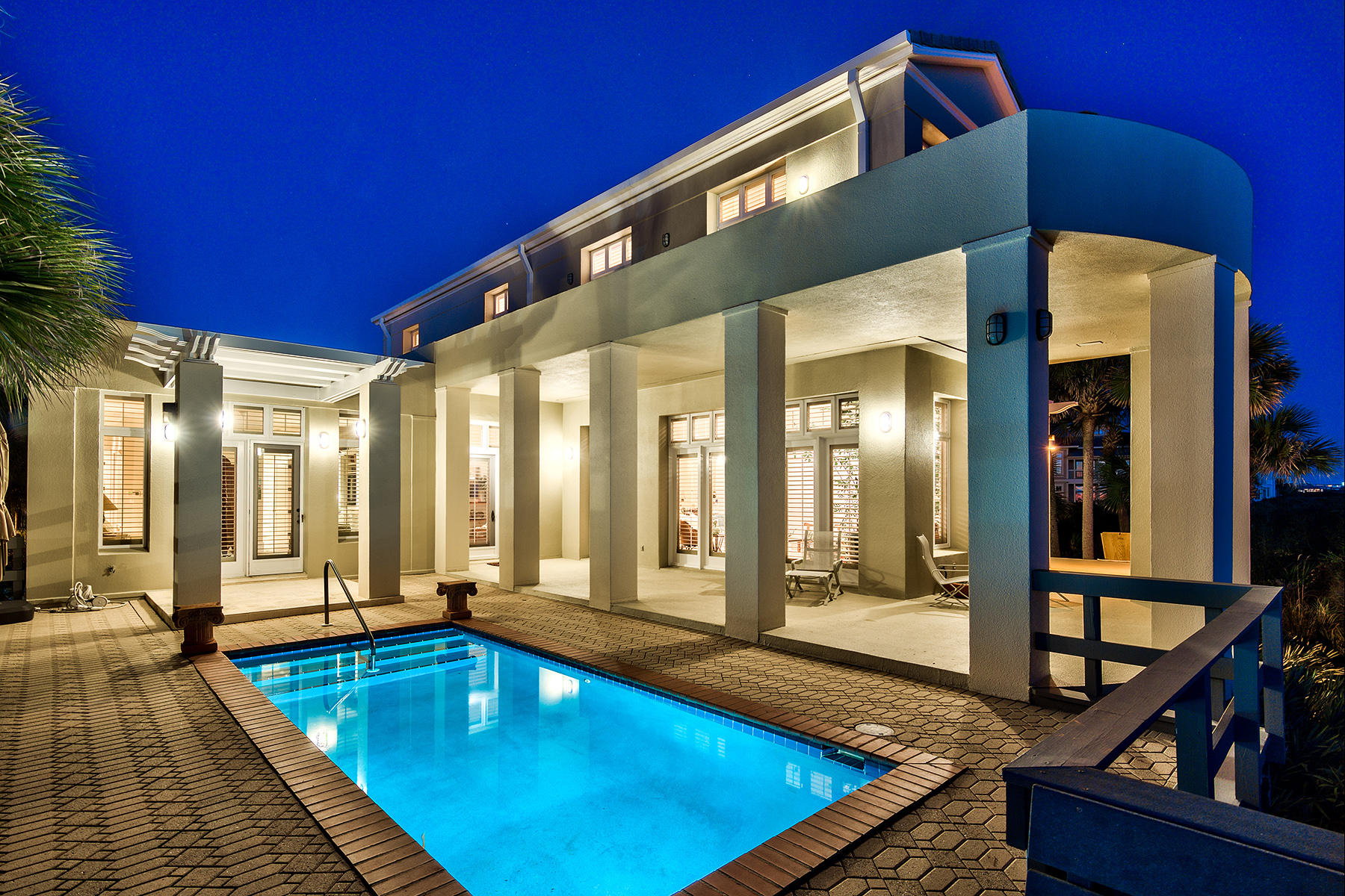 Estate gulf front home with 80' of beach atop a high Gulf dune. The gated, non-rental community of Gulf Dunes is located on the western edge of Blue Mountain, off of scenic 30-A.
Designed by Tom Christ, 27 Gulf Dunes is influenced by Seaside classical and contemporary elements. Beneath this gracious floor plan lies a strongly built home on a large lot.
At 4413 sq ft, this 4 bedroom, 4 1/2 bath property offers panoramic gulf views and one of a kind coastal living with understated interior elegance.
The open floor plan features wonderful 12' ceilings surrounded by an abundance of windows and balconies.
Your guests will be warmly greeted by a meandering driveway, visitor parking, and stunning shutter-lined front entry. The over-sized garage leads to the spacious work-bonus room, plus an elevator from which to easily bring groceries up to the main level kitchen.  

The Main Level's highly desirable open and spacious floor plan offers the kitchen, living, dining, as well as master bedroom. Step outside the Main Level to discover a heated saltwater gulf facing pool and large outdoor deck where you can view stunning Florida sunsets, entertain or simply take in the fresh gulf air. 

This exceptionally well-maintained custom home features light stone floors, a gallery, wet bar, storage, Viking Sub-Zero side by side refrigerator, Viking gas cooktop with custom stainless steel hood, Thermador warming drawer, wine cooler, and walk in pantry.  

The master suite on the main level provides easy access to the pool deck, a master bath with stone floors, large walk in closet, and dressing area. 

Upstairs, you will find a spacious sitting TV room that serves as a central gathering place for the two spacious bedrooms with en suite baths. All upstairs rooms open onto a large deck providing magnificent white sand and water views. 

With room to build a Carriage House, this comfortable gulf front dream home is ready to provide a lifetime of beach memories!