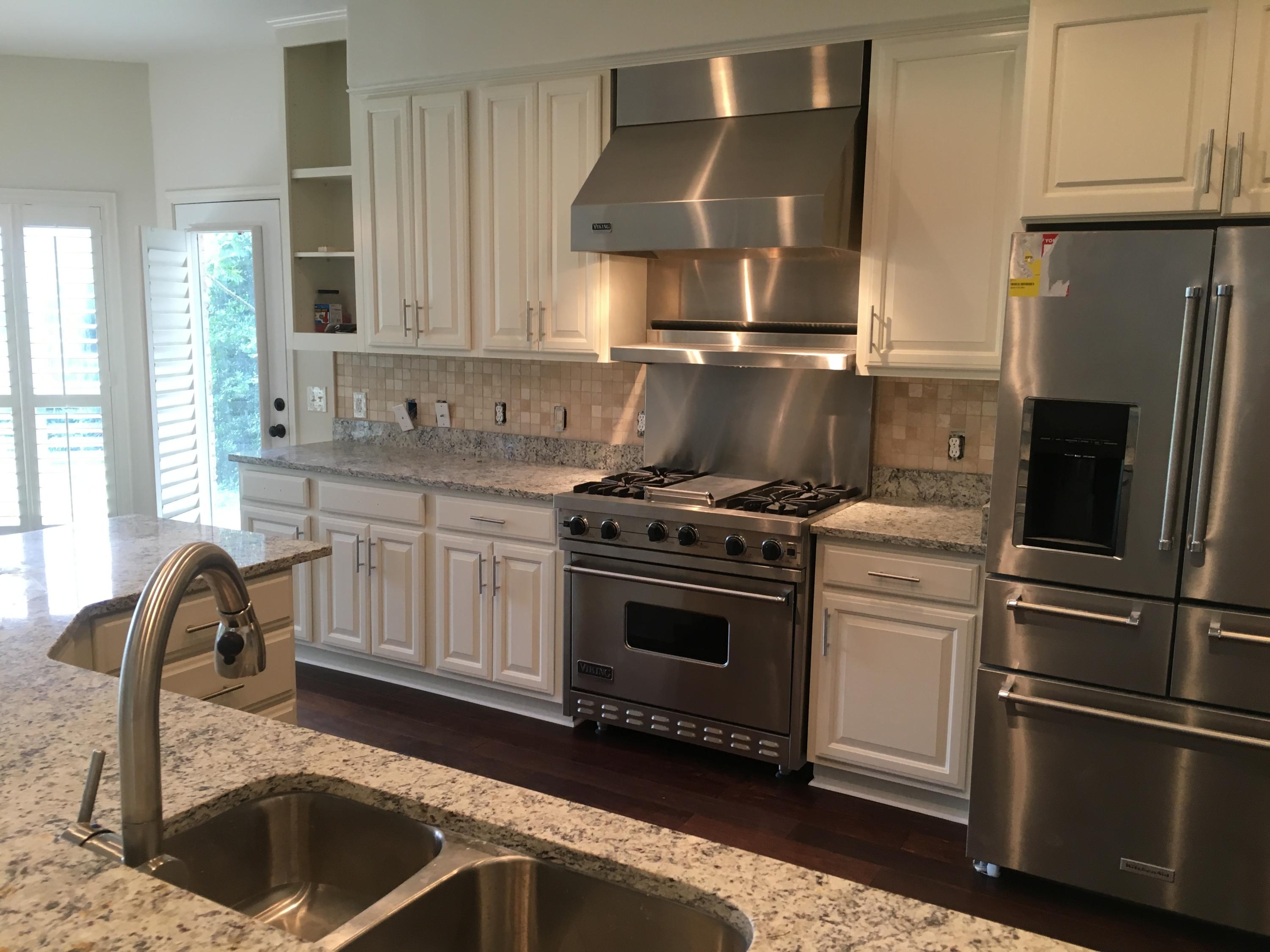 Beautifully renovated WATERFRONT home in Destin. Unbeatable price. High ceilings, circular driveway, all brick home, new flooring, granite, kitchen-aid and viking appliances. 4 bedrooms plus office. Direct waterfront on protected Marler Bayou. Dock with 2 boatslips, water, electricity, covered boathouse and boat lift. Must see to believe.