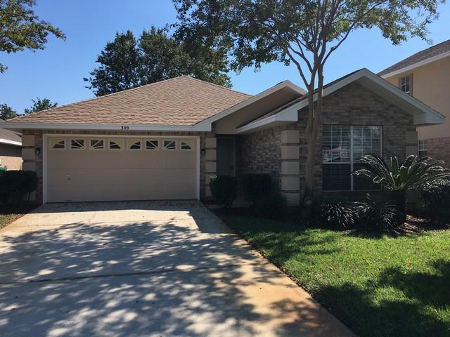 Don't miss out on this beautiful 3bed/2bath Destin home with breathtaking lake views from almost every window. This home has carpet in bedrooms, wood style flooring, ''Fit Luxury Vinyl Tile Planks'', in living area and kitchen. Kitchen includes an island for extra cooking space, double sided refrigerator with ice-maker, dishwasher, stove and built in microwave (all stainless appliances). The open floor plan with high ceiling and split bedroom plan make this a very livable and spacious home. Master suite overlooking lake has a great bathroom with walk-in closet and double vanity. The electric fireplace is perfect for those cool breezy nights. Double car garage with attic. Just minutes away from Destin's sugar white beaches, shopping, golf and fine restaurants. Emerald Lakes is a gated community with project facilities included a swimming pool, tennis courts, playground, picnic area, basketball, sidewalks and lakes. Security System wiring is in place and available to a new tenant at their own expense, No smoking or pets. Easy application process, apply today!