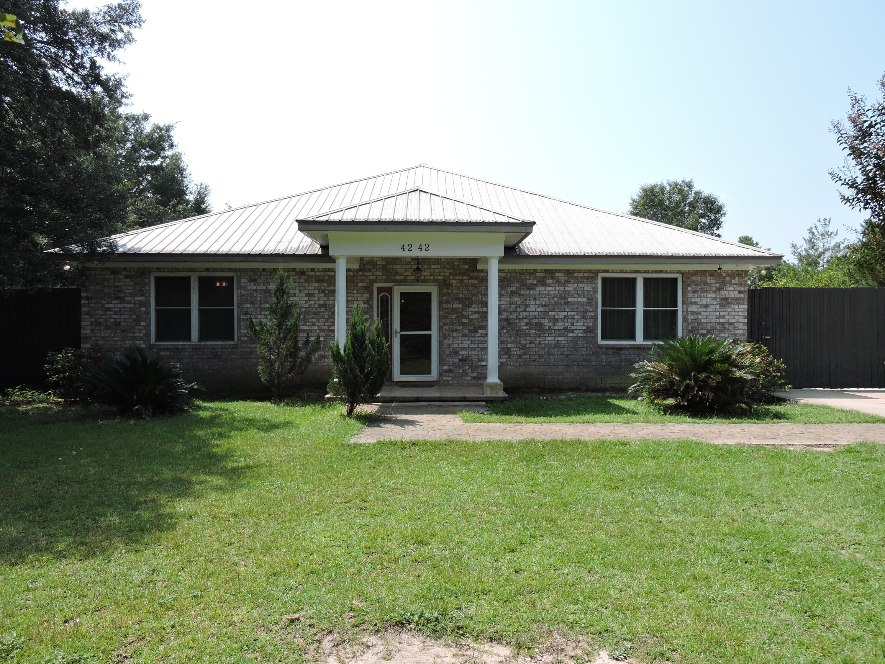 Available Now! There is ample room for everyone in the large 3337 sqft 3 oversized bedroom suites with an large office/flex space. The large eat in kitchen features ample oak cabinetry with above and under cabinet lighting, stainless steel appliances, and opens to a true Great Room (30x19), which opens up to a large covered porch with hot tub. The master suite is one of a kind with large treyed ceiling, 2 large walk in closets, completely separate his/her sides in the master bath. One side has a whirlpool jacuzzi tub/shower combo and the other side has a walk in shower with over head rain shower head w/ digital control steam generator. The home features a screen enclosed pool with pool maintenance provided. There is also a 5 bay pole barn with 2 section enclosed, RV/Boat parking with electric/water hookups.  Available to show on nights/weekends with appt.