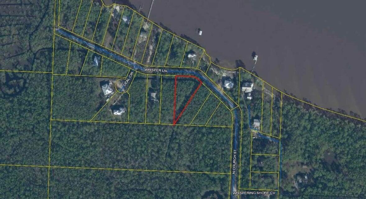 Bay Views!  Wetlands Mitigated and Permits in hand.  You only need house plans and a building permit for your Dream Home!!  The site uplands so no further wetland mitigation is necessary.  This wooded lot is across the street from Choctawhatchee Bay.  Potential forever bay views  with platted  park across the street.  Over a half acre of land to build your dream home.  Just a short drive to beaches, restaurants and shopping.