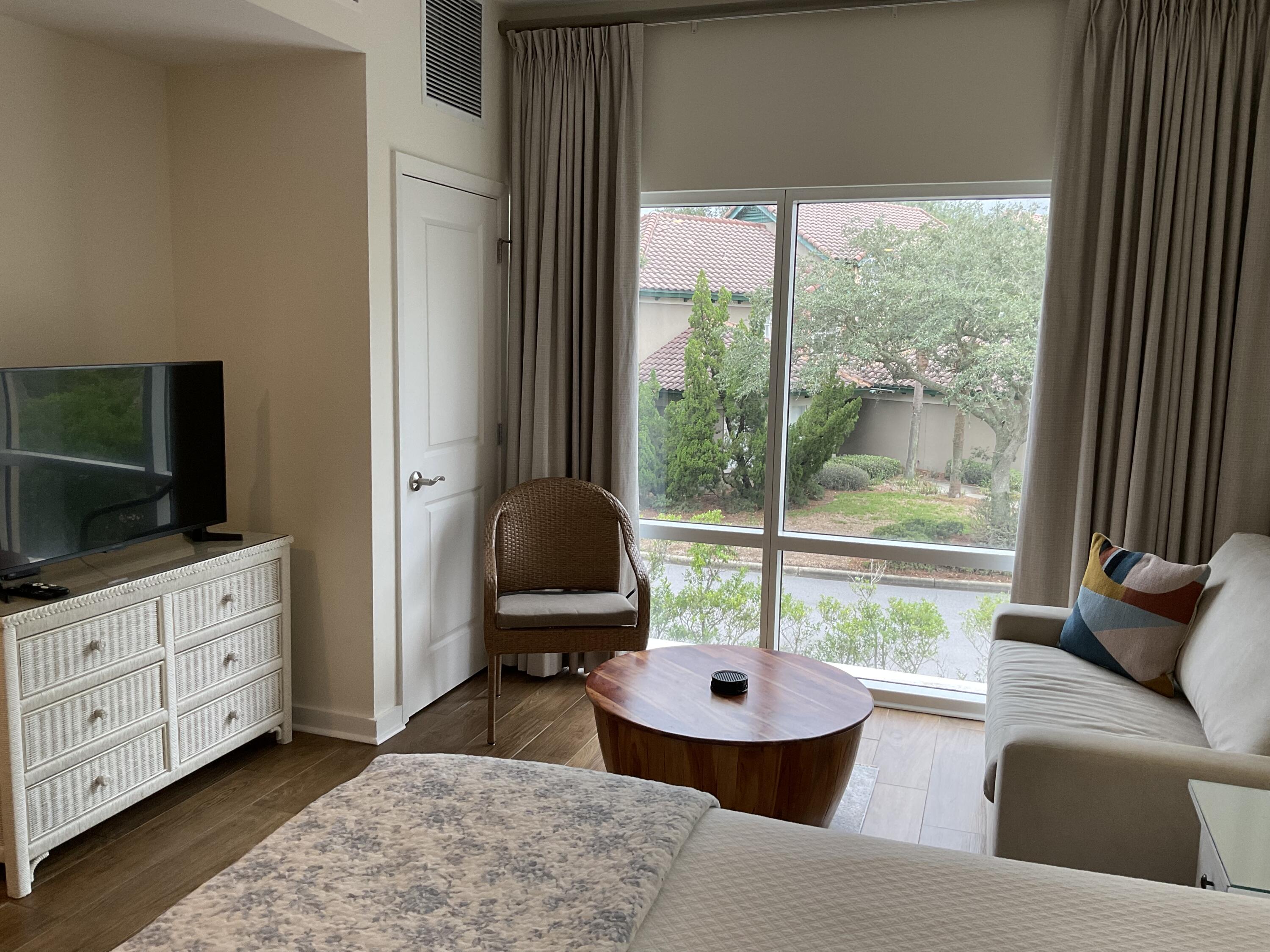 Adorable studio condo in highly sought-after Luau Condominium complex.  Unit 6108 has been completely updated with beautiful quartz countertops in the bathroom and kitchenette, coastal casual furniture, new wood-look tile flooring, paint, and curtains.  New flat screen TV, HVAC (2021) and more.  Luau amenities include a workout room overlooking the most popular swimming pool in the resort (with a swim-under waterfall!), Sunset deck on the top floor, an outdoor pergola with grills and seating, individual owner's storage cages, and a seasonal Tiki Bar on the pool deck.