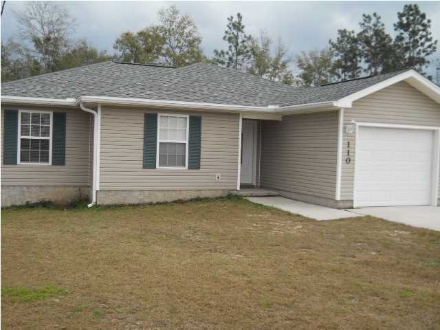 This 3/2 plan has loads of great features including oak cabinets, tiled flooring, granite counter tops, smooth-top stove, built in Microwave over stove, 1-car garage with pull-down stairs and an auto garage door opener. The Master bedroom has a dedicated computer area and cathedral ceiling. The Master bath has a whirlpool tub with cultured marble surround and vanity. There is also a cathedral ceiling in the livingroom, an 8'X5' foyer, and a bay window in the dining area. There is a small covered porch in the front, a 12' X 10' deck in the back, a storage shed and an extra 12' X 21' extra concrete drive alongside the main driveway.