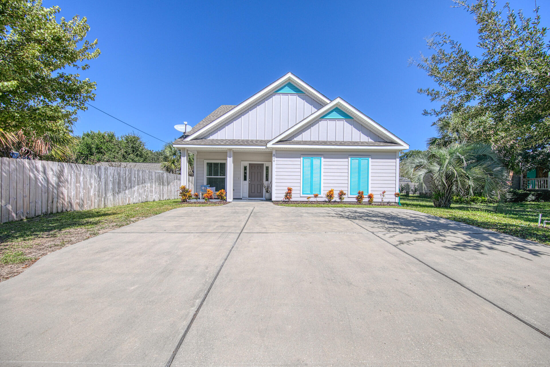 A RARE FIND IN DESTIN! Built in 2015. One of only a few newer homes located in the heart of Destin. It's conveniently close to restaurants, shopping, parks,  Destin Marina boat launch, Destin Elementary, and the famous Destin Harbor. This 4 bedroom, 2.5 bath home features an open floor plan & 20+ ft. vaulted ceilings. The gourmet eat-in kitchen includes stainless steel appliances, soft close custom cabinets with numerous oversized drawers for pots and pans, granite countertops & big center island that seats 4-5 people. The master bedroom, downstairs, features a spacious master bath with a double sink vanity, a large walk-in custom tile shower and a huge walk-in closet. There's a powder room downstairs for guests and a privacy fenced backyard perfect for entertaining family and friends. The large laundry room boasts a shop sink and a huge storage closet. Upstairs, you'll find 3 more bedrooms, a large bathroom with granite countertops, a garden tub, and a double sink vanity. There's a surprise "BONUS" entertainment room connected to one of the upstairs bedrooms. ~Hardie-Plank siding, dimensional roof shingles, hurricane impact windows, laminate plank flooring, ceramic tile, stainless steel appliances, and custom cabinetry are some of the luxury upgrades this home features. Platinum Home warranty can convey to buyer. Irrigation system included. This 5 year old home looks brand new. Immaculately cared for. Come see it today, it won't last long. Buyer to verify all dimensions and information.