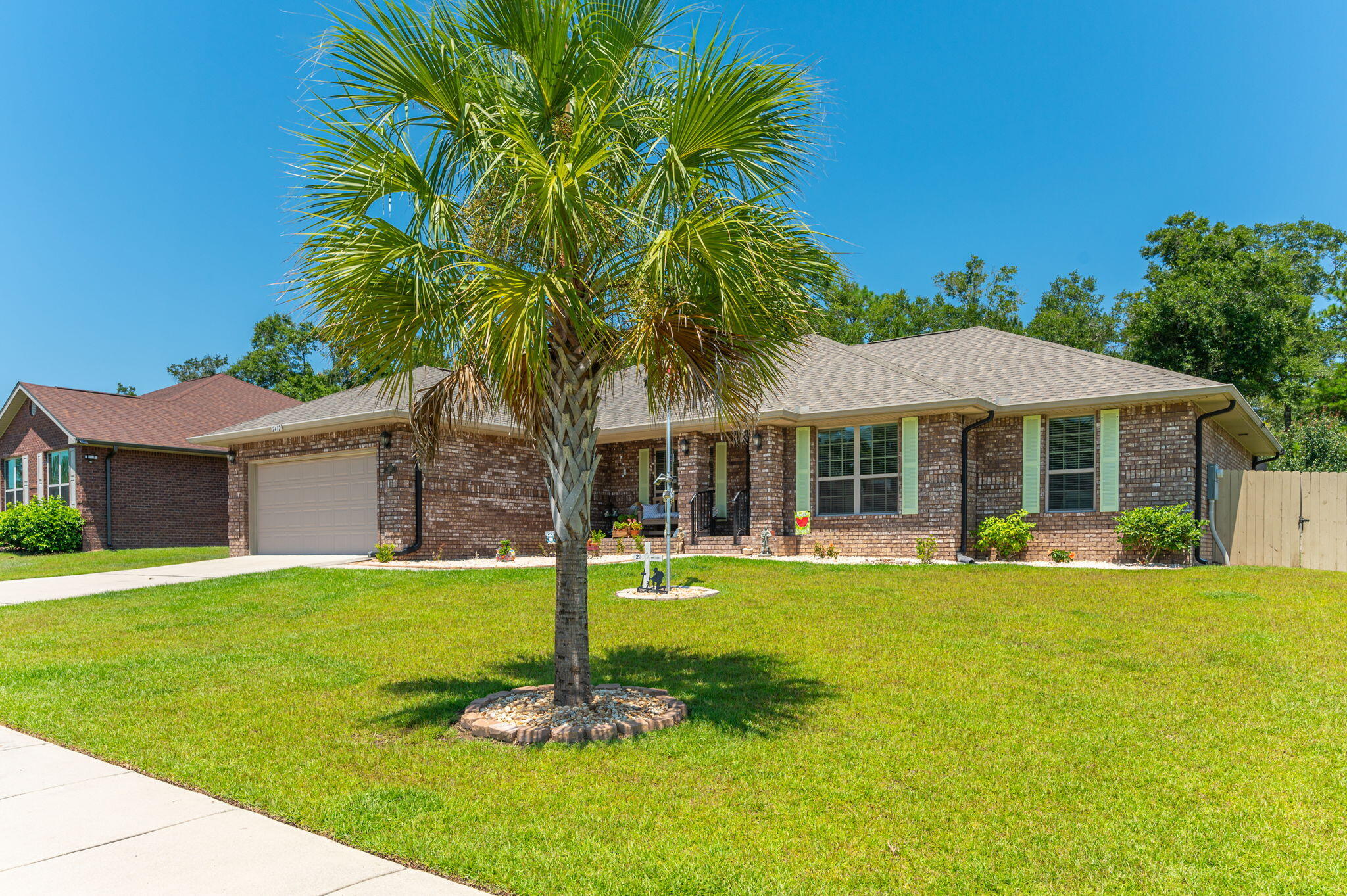 Located only 5 miles from Crestveiw High School, this 4/2 has a ton to offer and is immaculate inside! Upon entering you are greeted into a foyer with a dining room to the left and an office to the right. The livingroom is spacious and offers views of the incredible backyard. The kitchen has extended cabinets and granite countertops, breakfast bar seating, stainless steel appliances, and a breakfast nook. The primary suite is generously sized, boasts a custom tile shower, and THREE walk-in closets! All remaining bedrooms are spacious as well. Head out back to the screened in patio that was truly made to entertain! Love to golf? There is even an area to practice your golf swings! This backyard features privacy fencing and a shed as well.