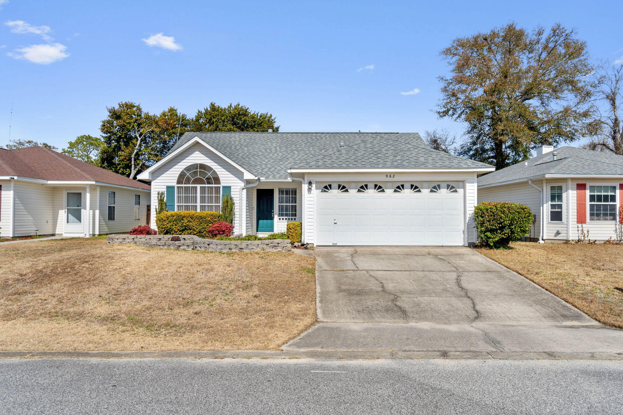Graced with an inviting charm, 962 John Wayne Circle in Fort Walton Beach offers a delightful coastal retreat perfect for everyday living or a tranquil getaway. This spacious 1,306 sq ft home features three well-appointed bedrooms, providing ample space for relaxation and rest. With two full bathrooms, morning routines and evening unwinding become a breeze for everyone in the household. The thoughtful design ensures a natural flow between rooms, fostering an open and airy atmosphere that welcomes you home each day. Nestled in a vibrant community, this property offers the perfect blend of serenity and convenience, with local amenities just a short drive away.