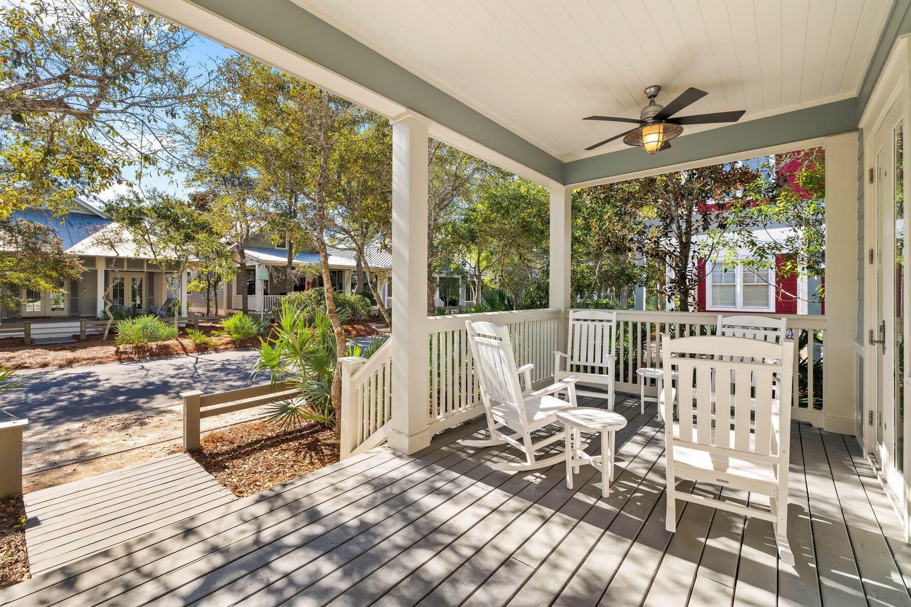 Located in the prestigious WaterColor community, this delightful Florida cottage is close to Cerulean Park and many other gardens, ponds and paths within the scenic Park District. The charming front porch offers a warm welcome with a dining table and a sitting area designed for quiet contemplation, reading or socializing. The first floor showcases a beautiful open living room, laundry, and three bedrooms, all with private bathrooms. Adorned with abundant natural light, the kitchen is the hub of the home. Granite countertops, a new refrigerator and breakfast bar seating make this a practical yet comfortable space. The rest of the house has cozy furnishings, wainscot features and neutral decor, creating a sanctuary of elegance and comfort. Noteworthy updates include beautifully refinished hardwood flooring, a new hot water system, a new air-conditioning system upstairs, and fresh paintwork inside and out. The downstairs bathroom has had a recent facelift. The driveway area in the rear of this charming property has ample space for an outdoor grill and/or trellis covering the parking area. The second floor offers a spacious loft area, currently furnished as a guest bedroom with a sofa and four twin beds. It has a private bathroom with a walk-in shower. It could easily be used as a kid's zone, home office, second living area or media space. Enviably located between 30A and Western Lake, the WaterColor community is well known for its outstanding amenities. Families will love Camp WaterColor with its lazy river, water slides and zero-entry pool. Enjoy the freedom to get around by golf cart or bicycle while visiting multiple community pools, the private beach club, tennis courts and complimentary watersports on Western Lake. Within strolling distance, WaterColor Town Center boasts a range of boutique shops, coffee shops and restaurants nearby.