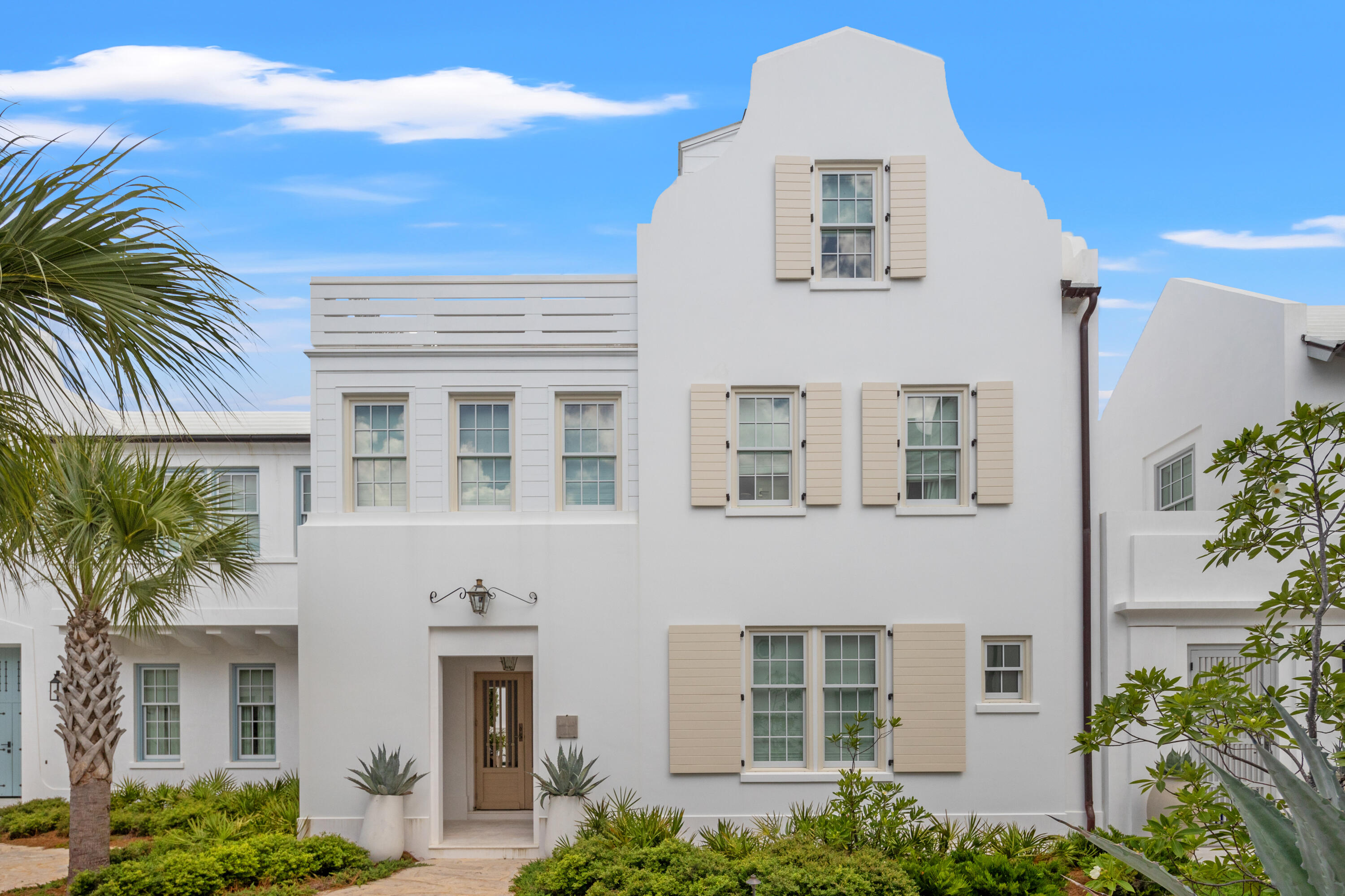 Designed by Historical Concepts, this 3,549 Square Foot 4 bedroom home enjoys views from its third-floor terrace looking down Turtle Bale Pedestrian Path which leads to a dune crossover and the white sand beaches that this coastline is famous for. Interior furnishings by April Tomlin Interiors set the tone for the level of quality found throughout this home. The first floor offers a spacious guest suite bedroom, an open kitchen/living/dining area looking out to a private courtyard and pool and a large entry loggia. The second floor offers a luxurious master bedroom suite, two guest suite bedrooms and a highly coveted additional living area.  The third floor conditioned den provides an office and wet bar area that leads to the outdoor rooftop terrace.