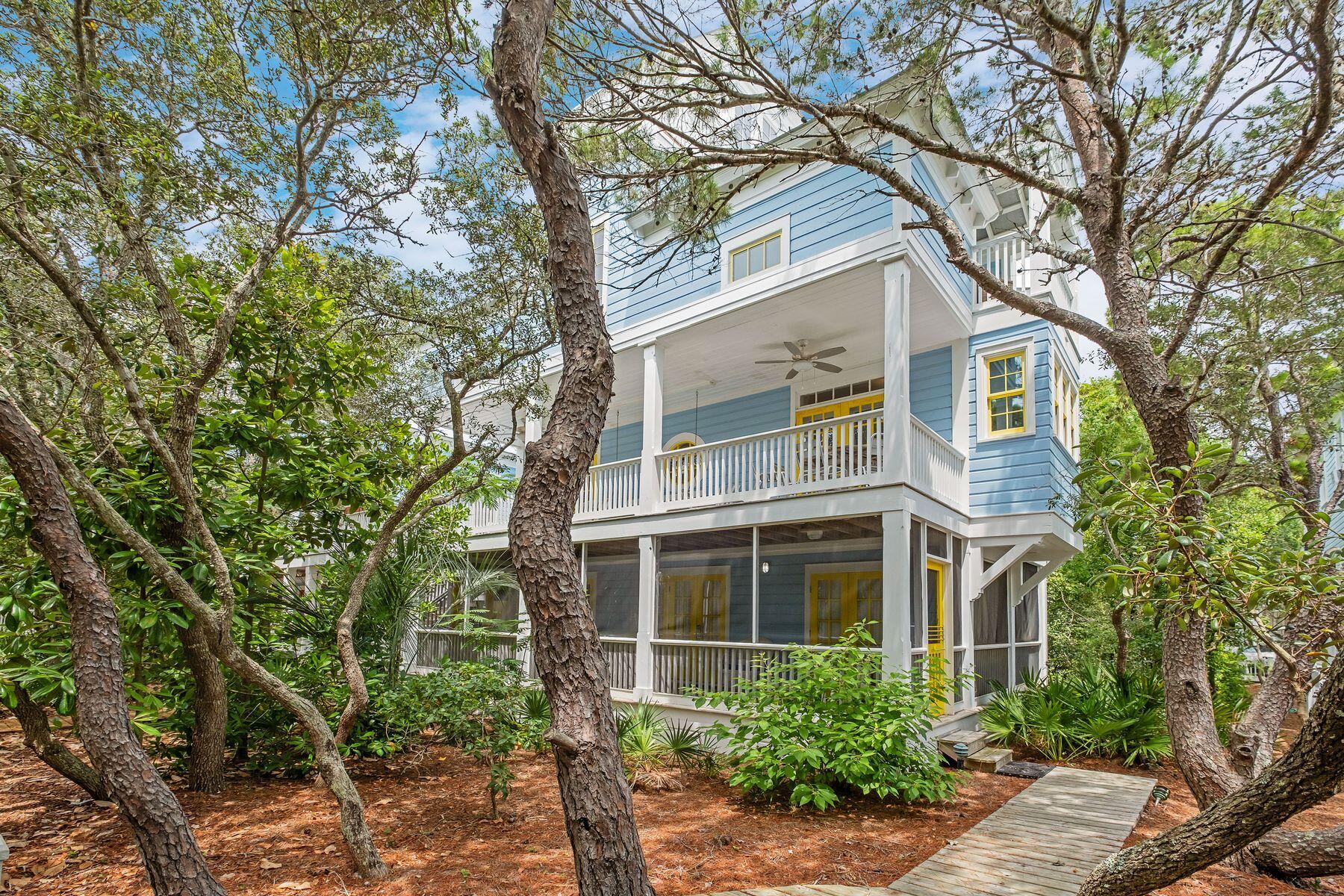 Experience unparalleled coastal living at Seaside Dreams, an exquisite property in the heart of Seaside, Florida. This unique offering comprises two charming cottages, American Dream and Another Dream. A Tower view in American Dream is among the best of towers in Seaside, perfect for sunrises and sunsets. Adorned in patriotic red, white, and blue, American Dream exudes charm with architectural details like vaulted ceilings, spiral staircases and built-in bookcases. This cottage shares running porches and balconies with its sister cottage, Another Dream. The second floor houses the main living and dining spaces, featuring a spacious family room, dining area, full kitchen, laundry room and a full bath. Upstairs, the loft space includes a trundle bed, while the first floor offers two guest rooms, each with a queen bed, built-in bench, TV and French doors leading to the porch. A second guest bath with a shower separates these rooms. In Another Dream, the upper level hosts an open loft with a trundle bed and a lofted queen primary retreat with a private balcony and full bathroom. Ascend one more flight to your personal tower, offering both indoor and outdoor seating with stunning views. The main level features a second guest room with a queen bed, French doors to the porch and a full bath. Porches run the length of the house, providing ample outdoor living space with porch swings and dining areas. Both cottages can be rented together or separately, making them ideal for second homes or investment properties with $130,000 in combined rental income. While they need some love to reach their full potential, they offer unique opportunities in a prime location. Located steps from the beautiful beaches of Seaside and the vibrant shops and restaurants in town, these cottages provide an idyllic coastal retreat. Enjoy amenities like a fitness center, three community pools and easy beach access. These "dreams" offer an unparalleled experience of Seaside living, where every detail reflects the charm and elegance of this beloved community.