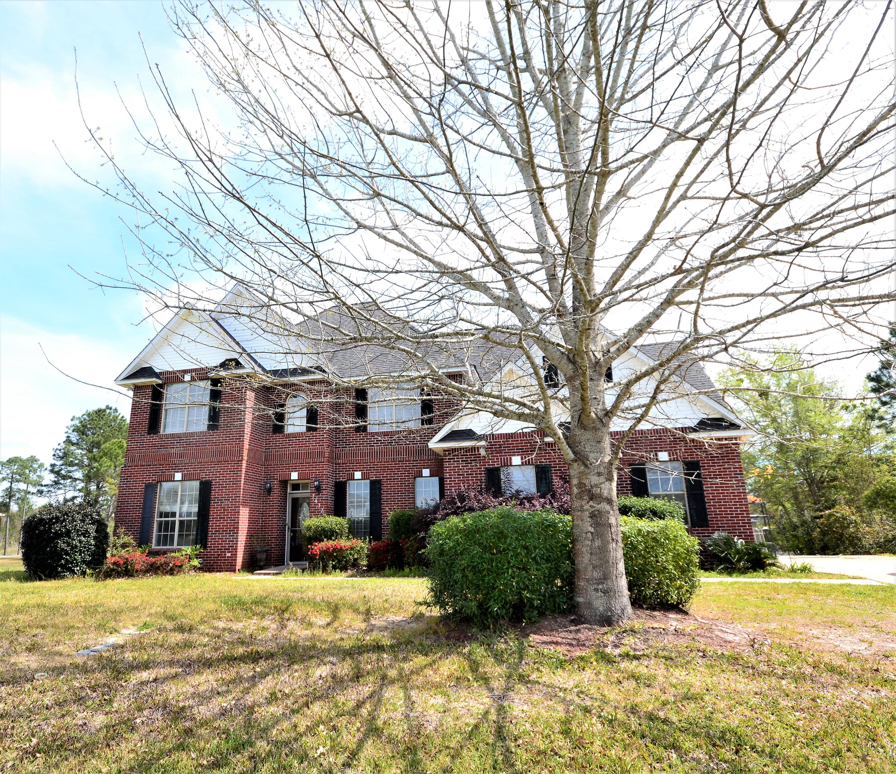 AFFORDABLE LAKE FRONT 2-STORY BRICK HOME having 4 Bedroom with 3 FULL Bathrooms also a home office, formal dining room, living room with wood burning fireplace and mantle OPEN to kitchen with granite eat-at breakfast bar, built-in desk, wine rack/hutch for glasses, huge shelved PANTRY, laundry room with cabinetry, deep sink, hanging area, washer/dryer hook-up, nice remote door oversize garage with gray paint floors. The Master Suite is Water Front with a separate sitting area then the Master bathroom double sink vanities, jetted garden tub, separate shower, a water closet to end with its HUGE walk-in organized CLOSET! This home has the stream line view of the length of Casa Grande's (5) acre lake stocked with Bass, Brim, Crappie, Catfish and Nickel Nose Bream for your fishing pleasure!