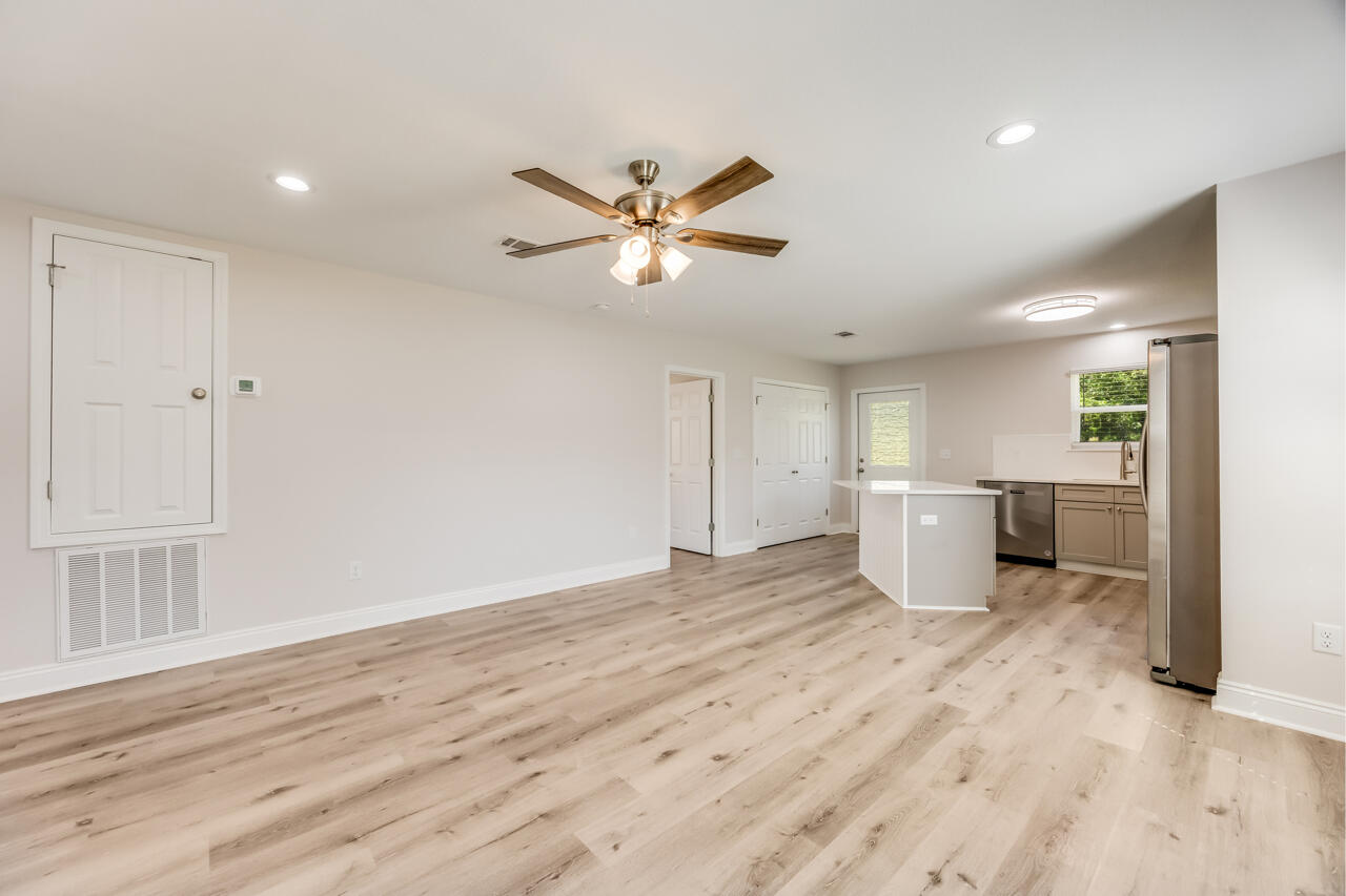 Discover Modern Luxury in This Stunning Home!
Step into contemporary elegance with this 2-bedroom, 2-bathroom residence that redefines modern living. Premium luxury vinyl plank flooring flows throughout, creating a cohesive and aesthetic that transitions from room to room. This home features a chef-inspired kitchen, showcasing granite countertops paired with a tile backsplash. The spacious center island provides ample workspace and casual dining. The open-concept floor plan maximizes space and natural light, creating an inviting environment perfect for both intimate gatherings and daily relaxation.Thoughtful design elements throughout highlight the home's attention to detail and quality craftsmanship. 
Your Dream Home Awaits. Schedule your private showing today!