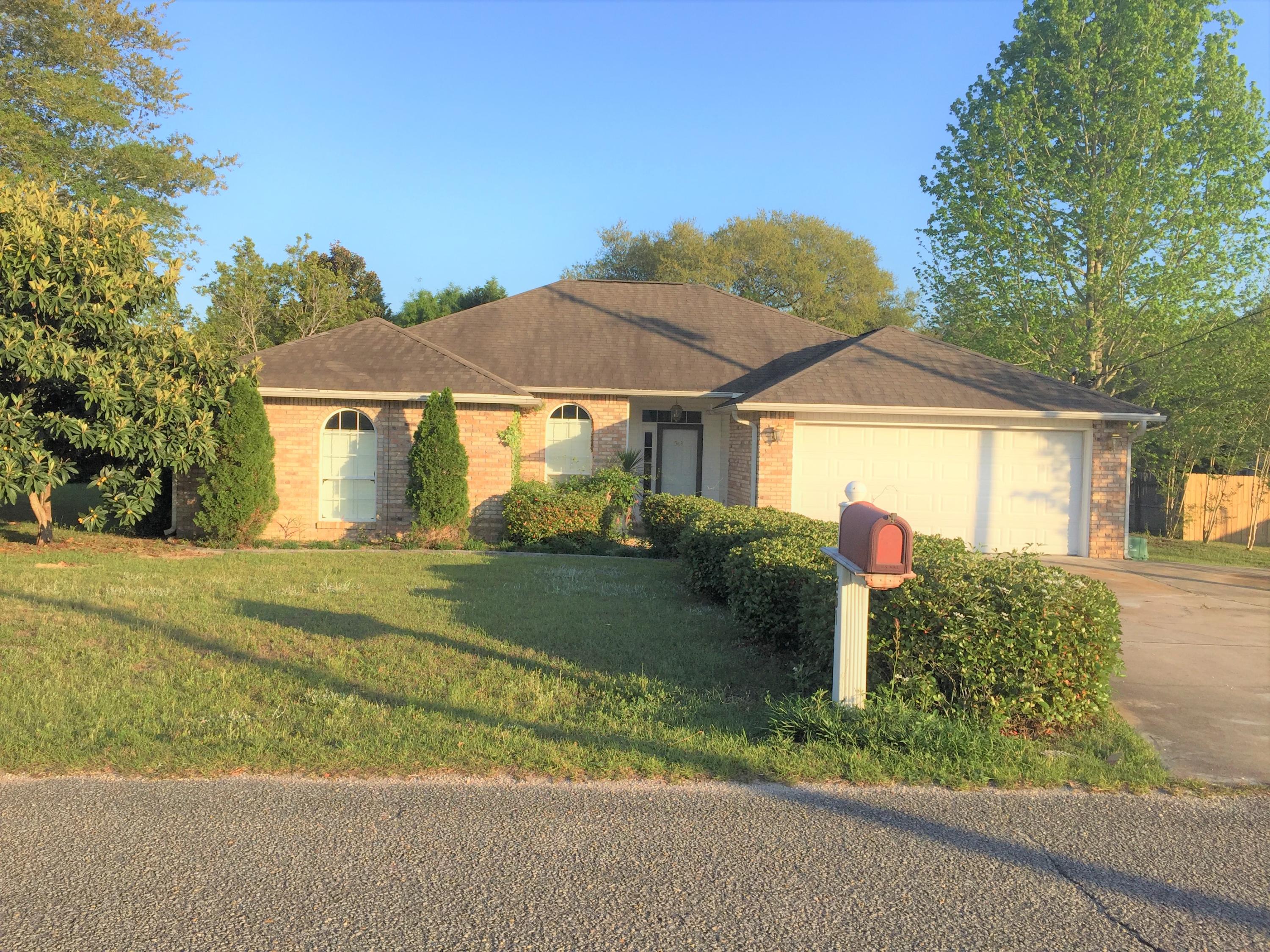 THIS ALL BRICK HOME HASBEEN FRESHLY PAINTED THROUGHOUT AND HAS A TILED ENTRY WALKWAY, YARD SHED W/MOWER, COMPOSITE DECKING THAT IS 14X24 PLUS AN ENCLOSED SCREENED PATIO WITH TILE FLOORS. THE INTERIOR OFFERS A CORNER FIREPLACE, MAPLE CABINETS WITH A CERAMIC TILE BACKSPLASH AND SOLID SURFACE COUNTERTOPS. ALL BEDROOMS HAVE WALK IN CLOSETS. LAMINATE WOOD FLOORING IN THE LIVING ROOM WITH CARPET IN THE BEDROOMS AND TILE IN THE KITCHEN, ENTRY, DINING AREA AND BATHROOMS. MASTER SUITE HAS A SITTING AREA WITH A DOOR TO THE ENCLOSED PATIO. WAIT TILL YOU SEE THE GARAGE! IT HAS BEEN CUSTOM DESIGNED AND INCLUDES FLOORING, CABINETRY AND LIGHTING. A GREAT LOCATION AND ALL SITUATED ON A LARGE CORNER, LEVEL LOT.
