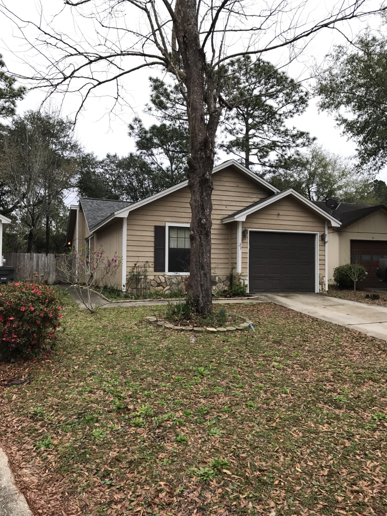 Welcome home to your 3 bedroom and 2 bath home located in a quaint neighborhood convenient to Eglin Air Force Base, Duke Field and Hurlburt Field. Home features cathedral ceilings with wood burning stone fireplace in the great room. Fireplace accented with hearth and mantle which is great for displaying all of those favorite treasures or decor. This home's architect design features a split floor plan that affords privacy for the master suite. The Kitchen is highlighted with plenty of storage cabinets, counter space, glasstop cooking surface, stainless steel double sink, refrigerator, dishwasher, ventilator and a breakfast bar for the perfect quick meals and convenience. Windows above sink so you can stay involved while in the kitchen. Completely remodeled master bathroom.