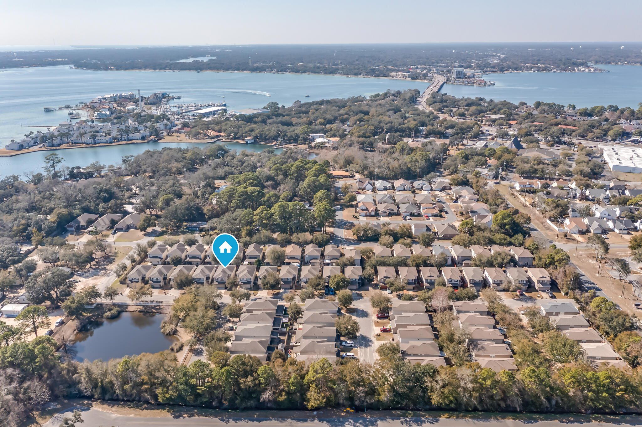 Just minutes from nearby military bases in SHALIMAR, FL! this well-maintained 2-story home offers an open floor plan with 3 bedrooms, 2.5 baths, and a 2-car garage. Enjoy a fenced backyard with a screened-in back patio--perfect for relaxing or entertaining.

The kitchen features granite countertops, newer stainless steel stove and dishwasher, a pantry, and a convenient breakfast bar overlooking the main living area. The living room is located downstairs, while an upstairs den/office provides flexible bonus space.

Retreat to the spacious primary suite with a large walk-in closet and a beautiful master bath room including double vanity with cultured marble, and more. Plus, Choctawhatchee Bay is within walking distance! Seller is offering new roof @ closing with acceptable offer, VA assum able with a 3% interest rate.