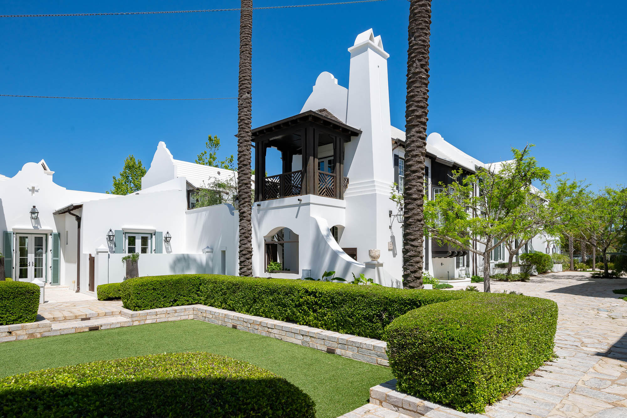 Introducing the breathtaking 35 Ladybug Court, a stunning real estate gem located in the coveted town of Alys Beach, situated on the pristine Emerald Waters of the Gulf of Mexico.  This extraordinary home offers an unparalleled coastal living experience located on the Sea Garden Walk Pedestrian Path. 
Spanning across an impressive 3,456 square feet, this residence boasts generous living spaces and an impeccable design. With four bedrooms, three full baths, and a convenient half bath, this home is designed to accommodate both family and guests with ease. 
The primary bedroom is a true oasis, offering a private and separate retreat from the other guest bedrooms. Here, you'll find a luxurious walk-in shower, a soothing soaking tub, and a spacious walk-in closet. The primary bed bedroom also features its own private balcony, providing stunning views of the Sea Garden Walk fire pit green space. 
Step outside beneath the covered outdoor loggia and discover the expansive courtyard, complete with a sparkling swimming pool surrounded by mature Olive trees. This outdoor haven is the perfect place to relax, entertain, and soak up the Florida sun. The courtyard also fronts the Sea Garden Walk Pedestrian Path, offering direct access to the beach and allowing you to immerse yourself in the beauty of the Gulf of Mexico.
To make the transition into your new coastal retreat effortless, this property is sold inclusive of furnishings. Every detail has been meticulously chosen to exude style and comfort, ensuring a seamless move-in experience.
Don't miss the opportunity to own this exceptional property in Alys Beach. Immerse yourself in the beauty of the Gulf of Mexico, relish in the coastal lifestyle, and make 35 Ladybug Court your own piece of paradise. Schedule a viewing today and prepare to be captivated by its charm and elegance.