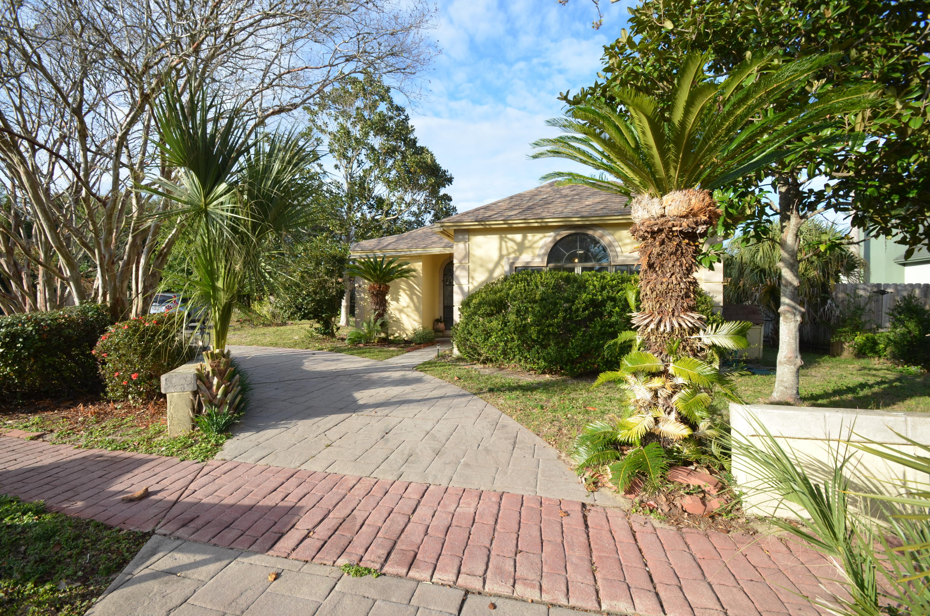 Looking for that adorable/updated Florida cottage that's tucked away towards the back of a subdivision??? We have the perfect one for you! Home is located on a corner lot and cul de sac with a half circular driveway. Nice updates that include new beautiful granite kitchen counter, stainless appliances, and tile flooring. Keep cozy during those cooler winter nights with a gas fire place. This home also has a lovely Florida room with plenty of natural light. This West Destin gem is close to boat rentals, fishing charters, many delicious restaurants, and enjoyable nightlife locations.