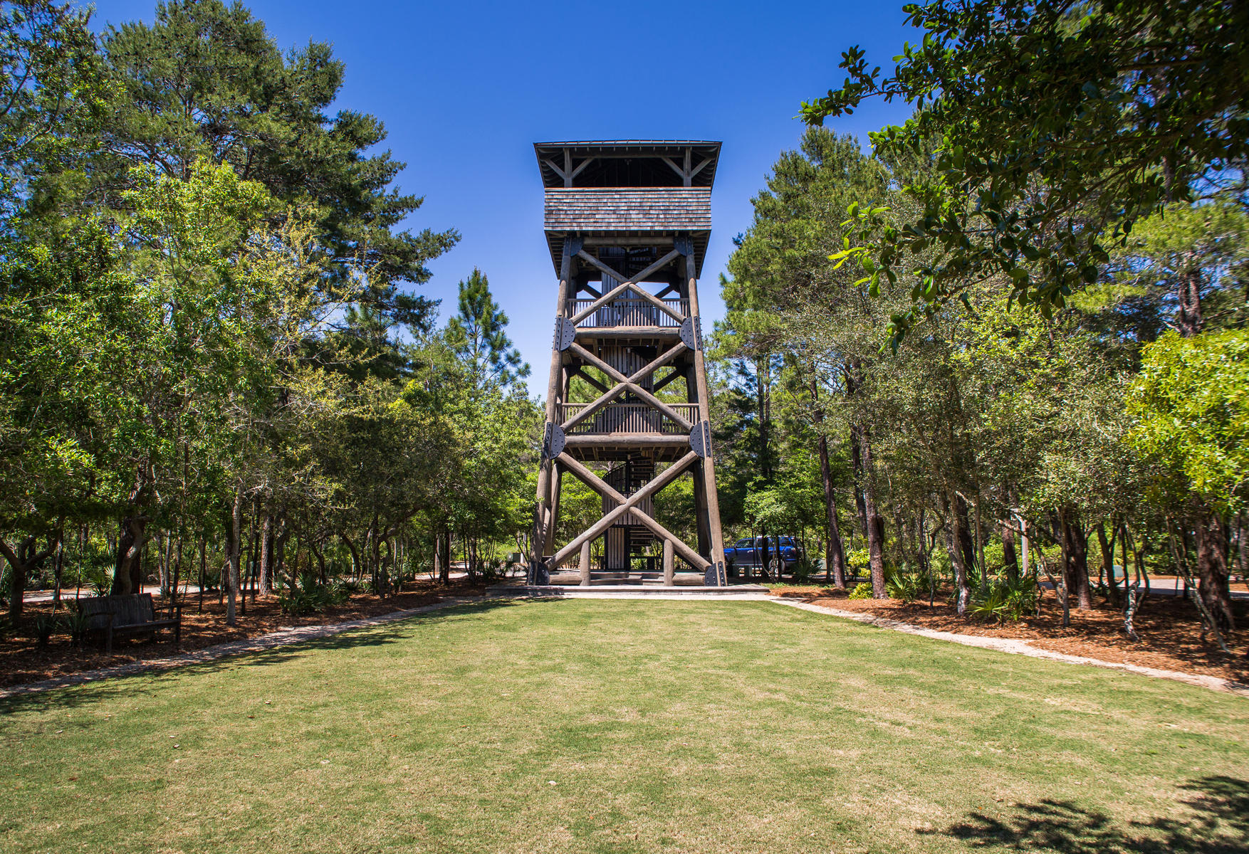 This is currently the only available lot for sale on the tower green. This Block 4 homesite will have a Type II house as indicated in the Draper Lake design code. Further information regarding a Type II house is available upon request. Stunning plans for a 2,788 square foot residence designed by R.W. Lowe Architecture are available for this property located in the west peninsula of Draper Lake Coastal Village. Ample outdoor space and living/entertaining areas are slated in the home plans along with 4 bedrooms and 4.5 bathrooms.
This lot is set directly across from the 40-foot observation tower capturing panoramic views that include the emerald waters of the Gulf of Mexico.