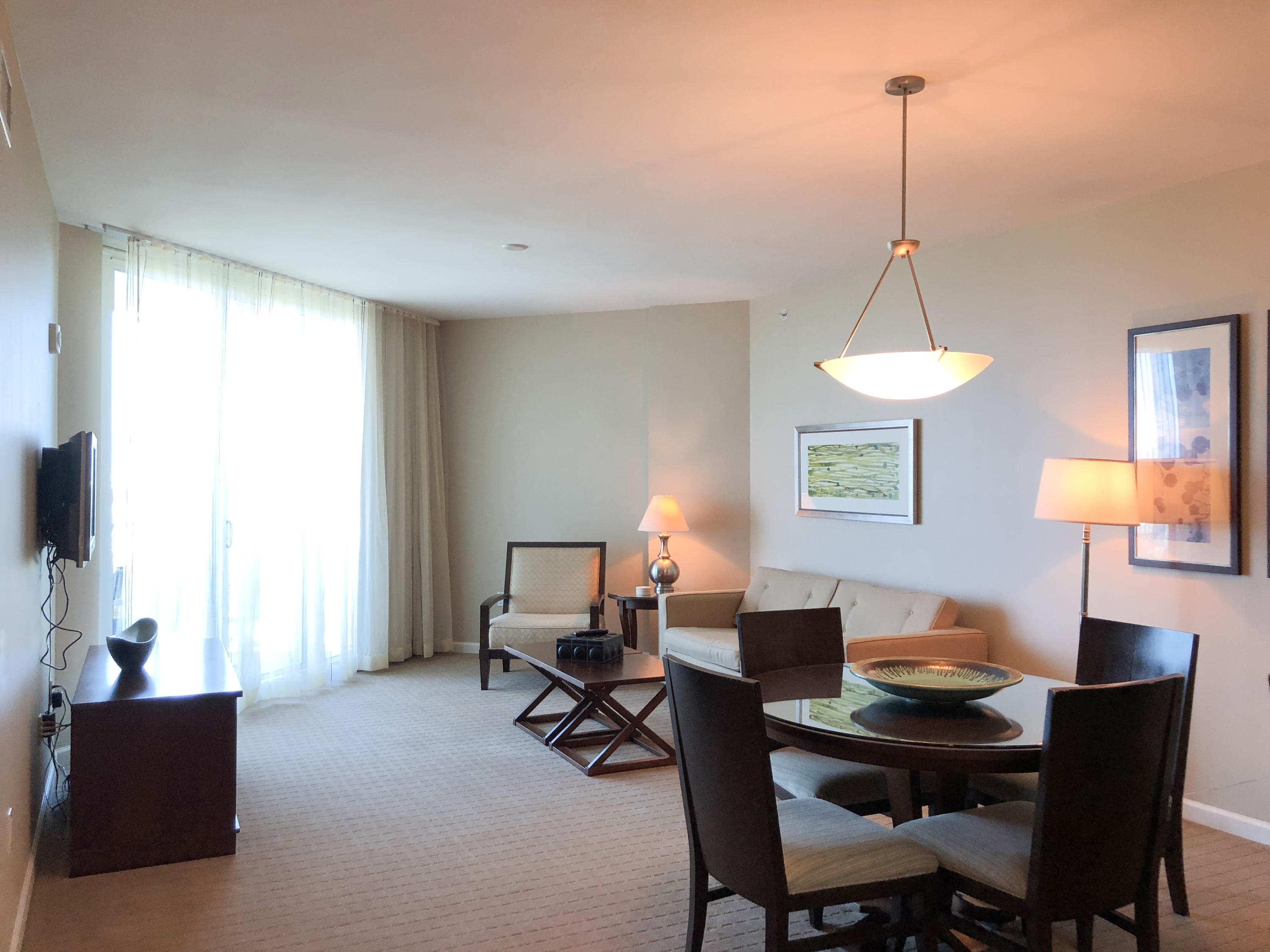 This top floor westerly facing junior two-bedroom condo offers views over the City of Destin and the Gulf of Mexico. It has an open concept living and dining area, as well as an inviting large balcony. The lagoon pool and water features are the resort's crowning attractions. Onsite amenities include multiple pools with waterfall features, a hot tub, playground, fitness center, and tennis and basketball courts. Also, newly added, is an on-site restaurant offering lunch, dinner, room service and even in-season poolside service. Shuttle service to the June White Decker Public Beach access is offered in-season. All utilities are included in HOA dues  water, sewer, electric, cable, WiFi, phone, trash! Excellent opportunity for a vacation rental, second or primary home.