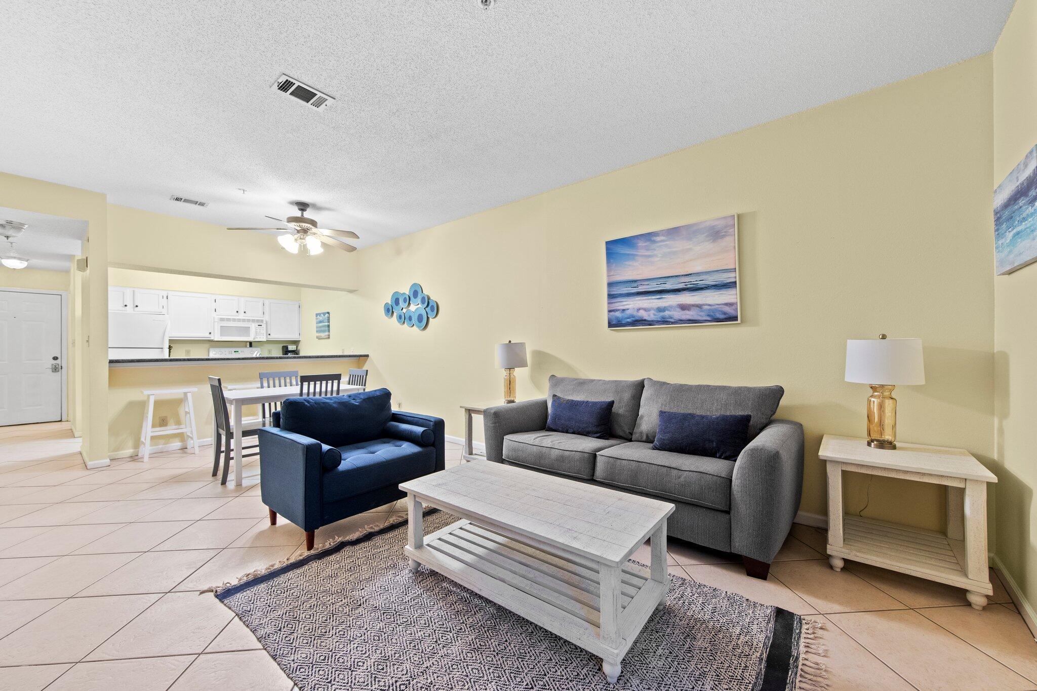 Newer carpet in this second-floor condo in the Pointe of View community that is  turn-key ready for rentals! This property is an excellent choice for those looking to invest in a vacation rental, use it as a primary residence, or have a secondary home that is within driving distance to the beach. Sleeps 6 people with the pull-out sofa in the living room to maximize the rentals.  It features a master bedroom with a king-size bed and its own bathroom, providing a comfortable living space. Additionally, there is another full-size bathroom, which is convenient for guests. This condo complex is located just behind Grand Boulevard, and it is only a few minutes away from Sandestin Resort, Sacred Heart Hospital, and the many attractions and fine dining of 30a. Call to schedule your appointment to see this unit in person!