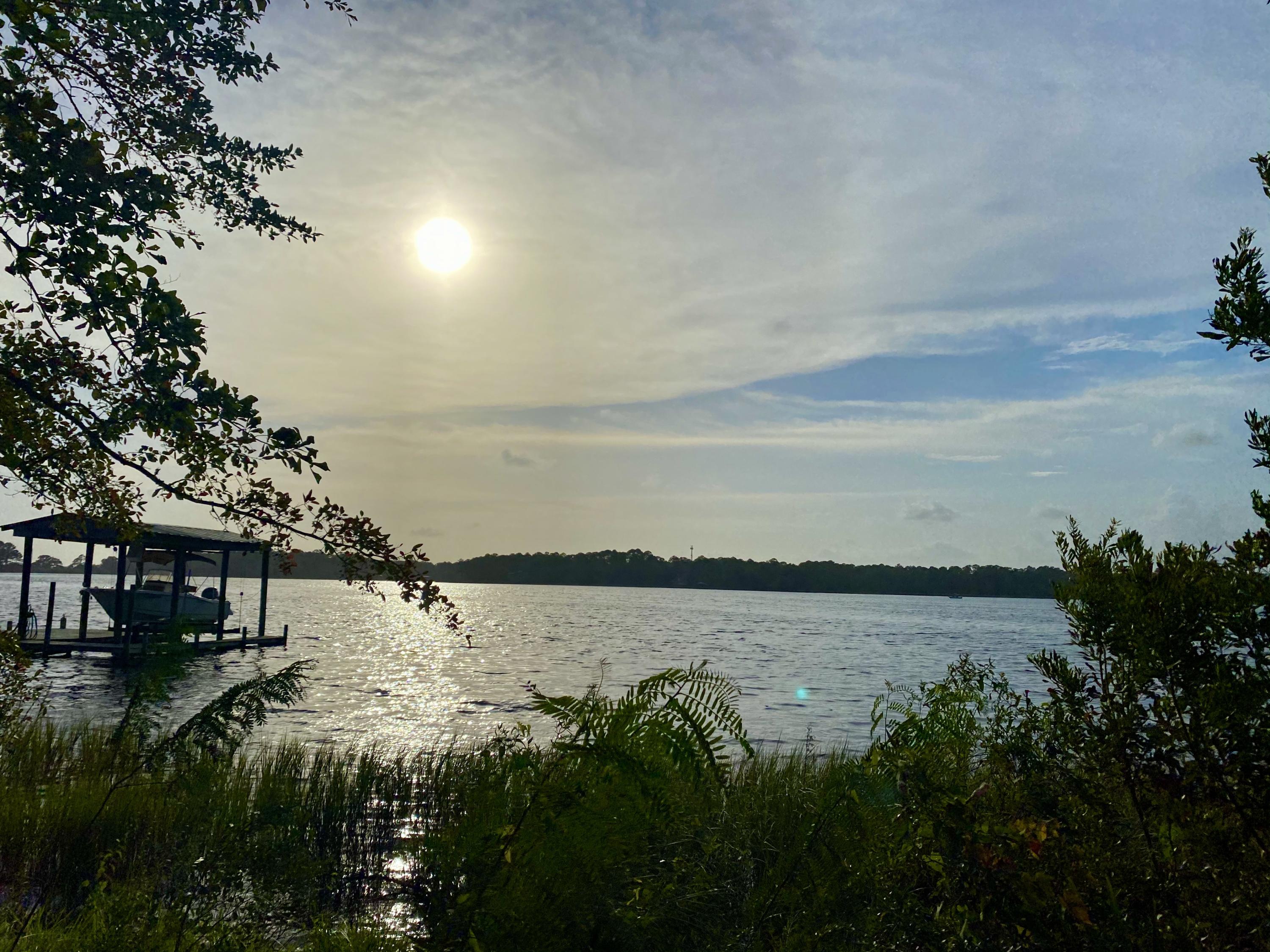 Another westerly view of gorgeous sunsets on Lagrange Bayou.  Freeport is conveniently located to the beaches of South Walton, Emerald Coast Airport in PCB and approximately 15 minutes to I-10 off Hwy 331.  So close to shopping and restaurants in fast growing Freeport.  The lot has been cleared and is not in an HOA.  Property appraiser website shows 65' on the water but measures approximately 72' (+/-) per the seller.