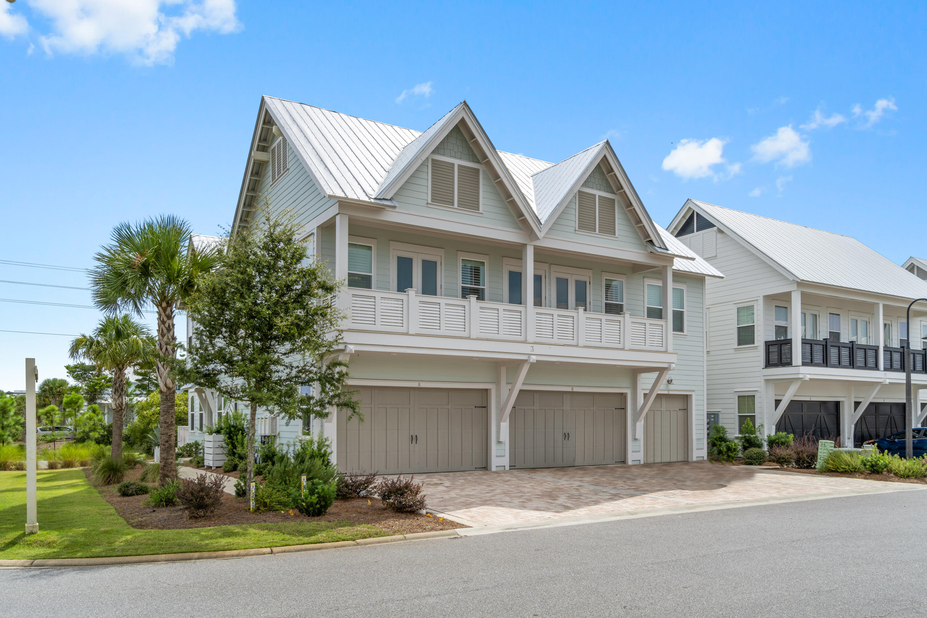 Exquisite end residence in the popular Prominence neighborhood, across the street from WaterSound Beach.  This designer furnished ''Bahamas'' triplex home uniquely offers 3 spacious bedrooms, 2.5 baths, luxurious and elegant living/dining/kitchen combo on the first level opening to an extra large patio with views of the HUB. Other features include a double garage with total parking for 4 vehicles, a 1 minute stroll to the pool and so much more.  Offered furnished and ready for your family to enjoy.