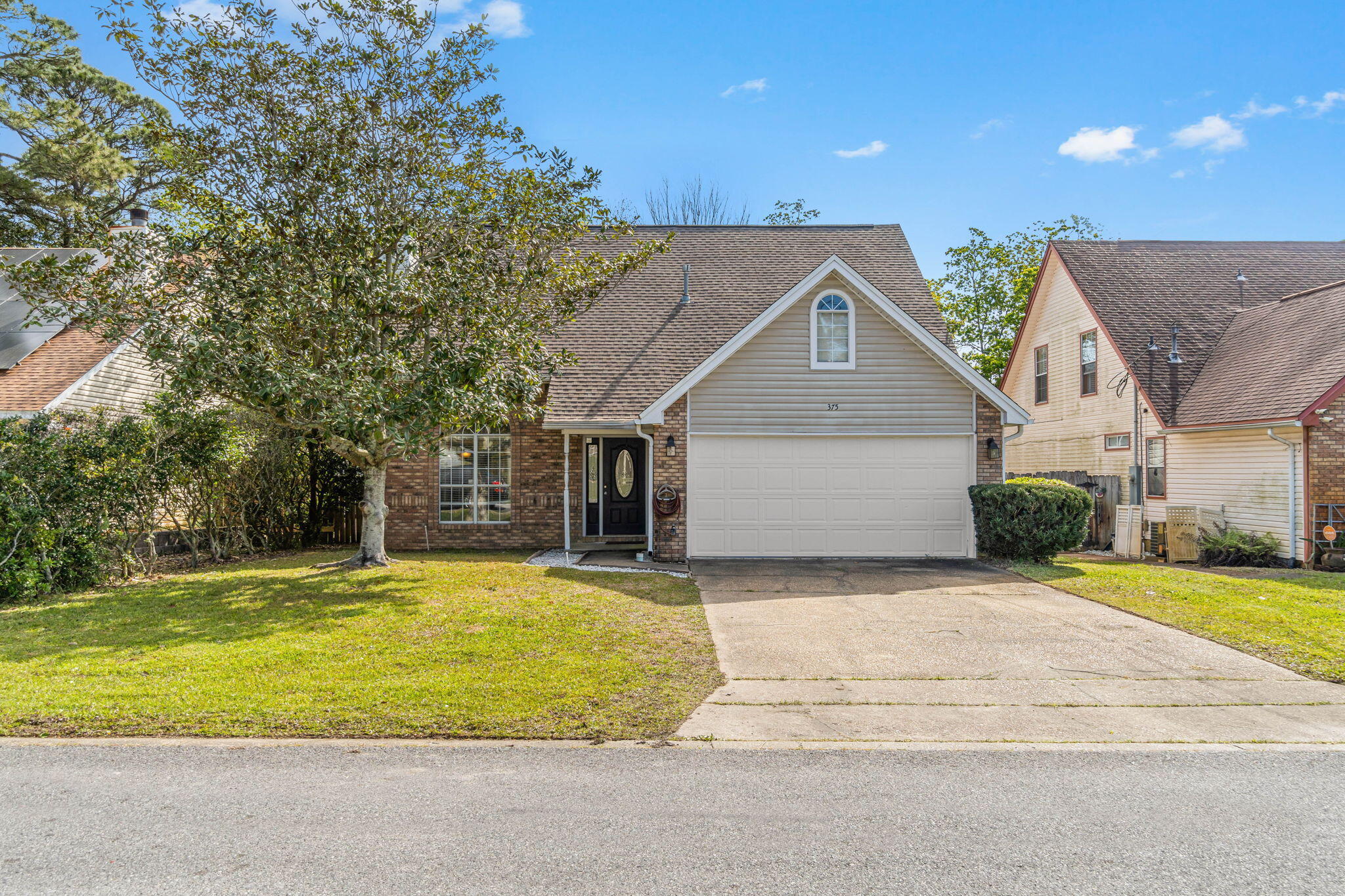 Back on the market due to no fault of the sellers, buyer's financing fell through a week before closing! Enjoy being literally minutes (only 4 miles!) to the front gate of Hurlburt Field! This lovely updated home in Mary Esther features a spacious 3 bedroom floor plan with 2.5 baths and a great sized loft for a bonus living space! Have peace of mind with a roof that was replaced in 2019 and a brand new April 2023 water heater and interior and exterior electrical panels! Pull into the driveway and appreciate the tasteful landscaping and beautiful magnolia tree, and inside you'll love the open concept and soaring cathedral ceiling! The large living room opens to a formal dining room space (also great for a flex room) and downstairs you'll find the master bedroom, interior laundry room, and half bathroom. You'll love the updated luxury vinyl plank flooring throughout the entire house other than carpet (just recently professionally cleaned) in the bedrooms. The kitchen has been beautifully updated with stunning quartz countertops, tasteful backsplash, and stainless appliances along with a pantry and large eat in kitchen area plenty large for your dining room table. From there you can walk out the sliding glass door onto the covered back deck overlooking the backyard. The master bedroom features a large room with a bathroom showcasing double vanities and a large walk-in closet! Upstairs you'll find a great sized loft space to use for a variety of purposes, and two nice sized bedrooms with ample closet space and an updated full bathroom. Did I mention all the popcorn has been removed from the ceilings? Enjoy this spacious home with a long list of updates in a conveniently located neighborhood with no HOA! Welcome home!