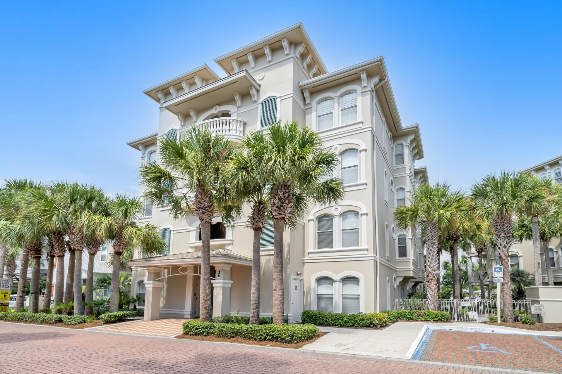 Fabulously furnished and renovated condo with an incredible location!  You, your family and friends will enjoy being in the center of all that 30A has to offer!  Deeded beach access to the turquoise waters of the gulf of Mexico and the white sand put beach living at your fingertips!  Take in the scenery while drinking your morning smoothie or eating dinner on your covered balcony looking over the resort style community pool.  Convenient floor plan offers open kitchen and living area, an oversized laundry room and an entry foyer with a built in area to leave bags, shoes and beach items.  Designer lighting brightens the gorgeous white and gray streaked kitchen island, accents the dining table and bathrooms.  Beautiful light colored ceramic tile flooring throughout hides sands and compliments the neutral painted walls with cheerful accent walls in several rooms.  Elegant gray cabinetry in the kitchen with under cabinet lighting pairs exceptionally well with the stainless steel appliances and the gray slate tiled gas fireplace.  Get ready for the day in chic bathrooms with a black pebble shower bottom and black trimmed shower doors.  This 4 bedroom, 3 bath property makes an excellent investment or vacation home!  The community tram offers rides all day to the beach.