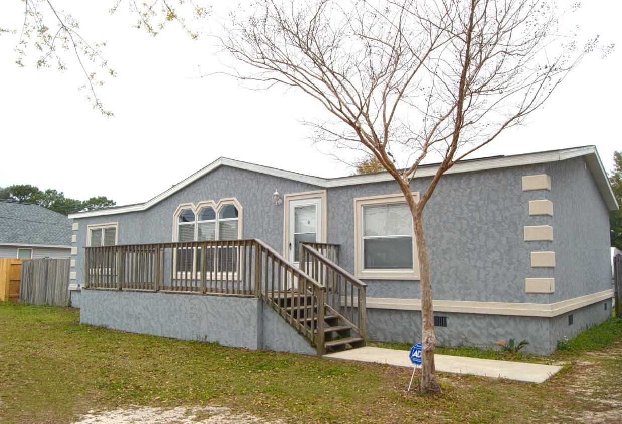 ExtraExtraRead all about ityes all of it!! Rarely, does a great offering like this one hit the market at such a reasonable price. With an upgraded stucco surfaced home, a very large backyard fenced lot, and an oversized detached garage you will have plenty of space to do the things you like to do with No HOA restrictions.
There have been many upgrades made in the last couple of years (Click on the Photos) that should provide the buyer with additional Peace of Mind, and cost savings. They include: A new air conditioning system, a new roof, new flooring in the bathrooms, and several new stainless steel appliances.
Priced to sell, and located just minutes away from the beach & Navarre's most popular restaurants, stores and entertainment outlets'. Come see it today!