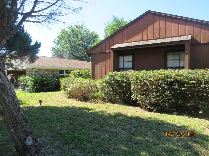 REO...Highly desirable location in Lake Lorraine Estates. Separate living areas. Family room has a fireplace and very large storage closet next to the fireplace. Enclosed rear patio overlooking the pool area. Storage building in the back yard. Lemon tree in the backyard. Hurricane shutters included. DON'T WAIT...YOU'LL BE TOOO LATE!!!