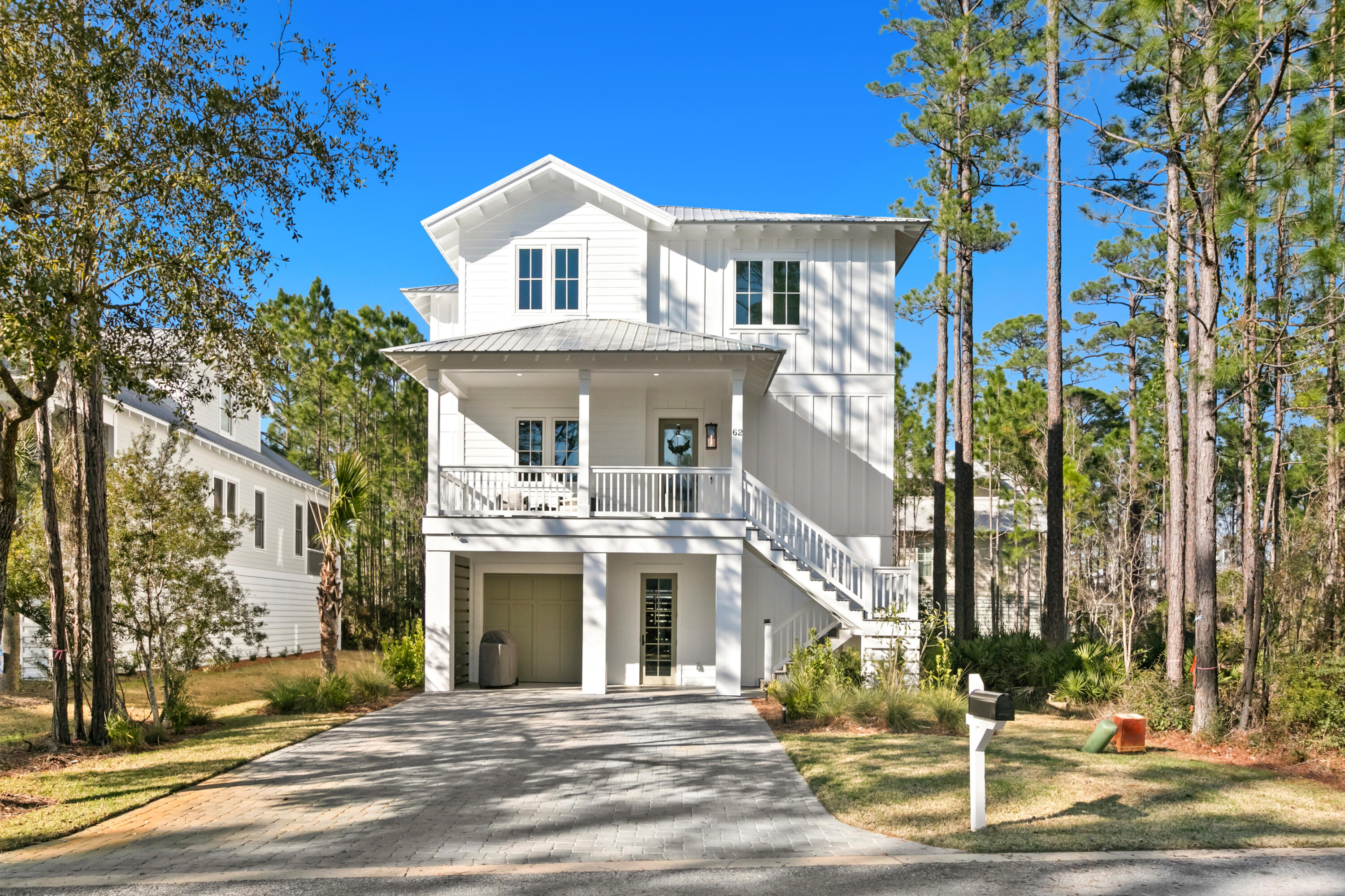 Introducing an exquisite piece of coastal paradise nestled near the Choctawhatchee Bay exemplifies the epitome of Florida living, offering a harmonious blend of modern design with calming bay views. 

Perched in an idyllic location, this stunning home invites you to experience the quintessential Florida lifestyle at its finest. With meticulous attention to detail and top-tier craftsmanship. This brand-new construction 4 bedroom 3.5 half bath has views of the bay and is a short distance to boat access. It sports a chefs kitchen for those who love to cook, a living room fireplace and a fire pit outside for those cool nights by the bay and a spa style master bath for when it's time to relax. The first floor is great for storage or workshop. Elevator shaft installed but no working elevator. This home's unparalleled location places you just moments away from Hogtown Bayou and the pristine beaches of 30A, renowned for their sugar-white sands and emerald waters. Explore charming coastal communities, indulge in world-class dining and shopping.