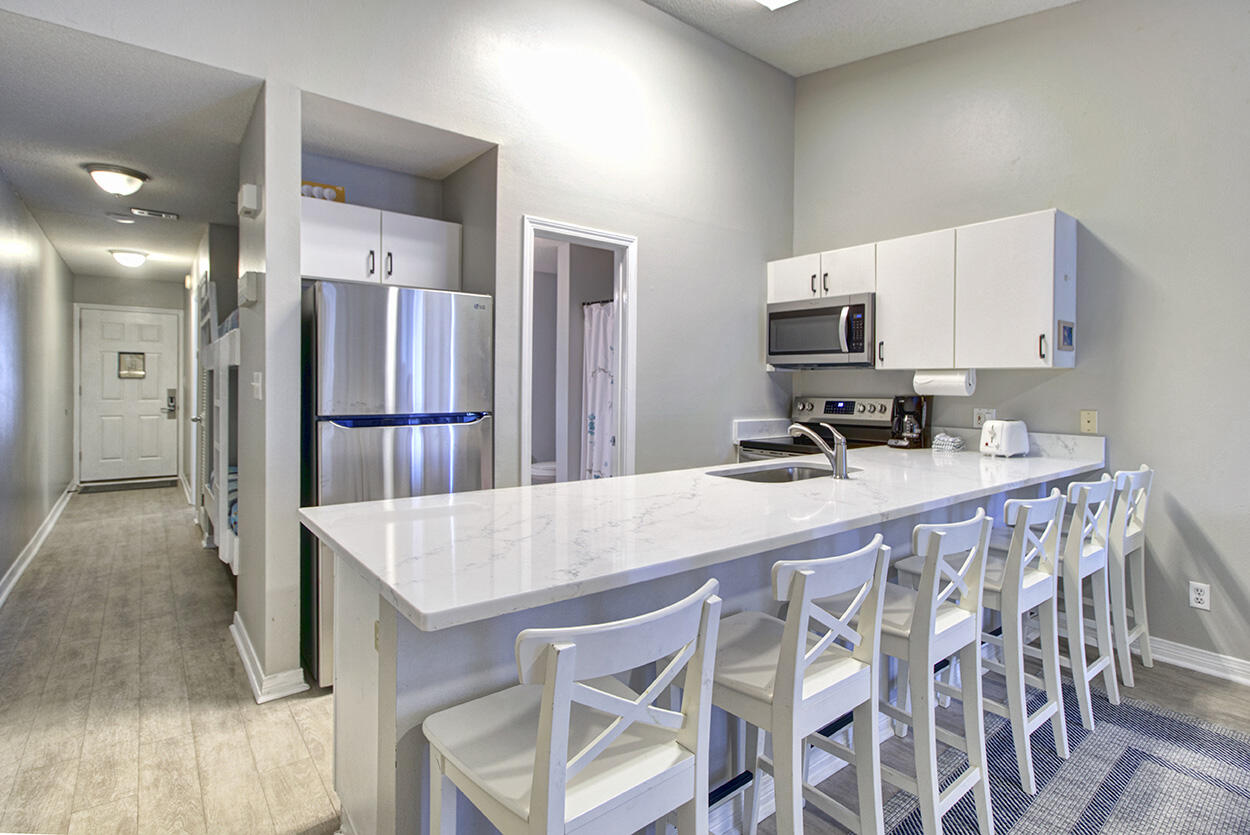 Enjoy the Emerald Coast beach life!  Gulfview II is located across Scenic Gulf Drive in the heart of Miramar Beach a prime location for maximum rental income potential. This third floor condo sleeps six, comes fully-furnished with hallway bunks, a king in the master and a sleeper sofa. Owners and vacationing guests can enjoy deeded beach access, plenty of parking, two community pools, hot tub, laundry facilities and a grill area.  The condo also features a, new roof, NEW SS dishwasher, range, refrigerator and microwave, updated quartz countertops and new bedroom flooring. A/C was replaced 2021. Guests have many dining, shopping and entertainment options within close proximity of the complex. The living area features a large sliding glass door which opens to your private balcony, the perfect place to relax and enjoy gulf breezes after a day at the beach. This unit has gross rentals through August of 37k.  If you are looking for an investment property or looking to purchase your own beach dream vacation condo then come take a look.  Wake up to white sand and warm tropical waters!
