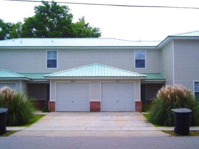This very nice two story home has updated luxury vinyl plank flooring downstairs, two bedroom townhouse with 1 car garage. Walking distance to HWY 98. Owner allows cats (must be full grown - no kittens) with a non-refundable pet fee; Sorry, no dogs. Available 11/26/21
All Coastal Realty Services residents are enrolled

in the Resident Benefits Package (RBP) which includes renters insurance, HVAC air filter delivery (for applicable properties) and our best-in-class resident rewards program, and much more! More details upon application.