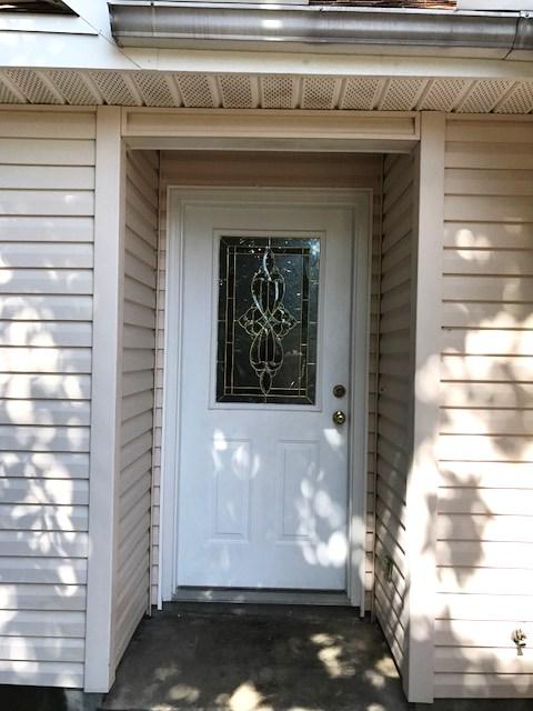 Shows like new! Great family home in the heart of Niceville. This 3/2 features new carpet & paint, spacious kitchen with appliances (refrigerator not warranted), eat in area, formal living and dining area and downstairs master suite. You'll also love the additional attic storage area and enclosed back porch. Owner will consider dogs (sorry NO cats)with a refundable pet deposit. Any dog must be spayed/neutered and housebroken. NO smoking! Any person 18 years old or older must complete separate applications.