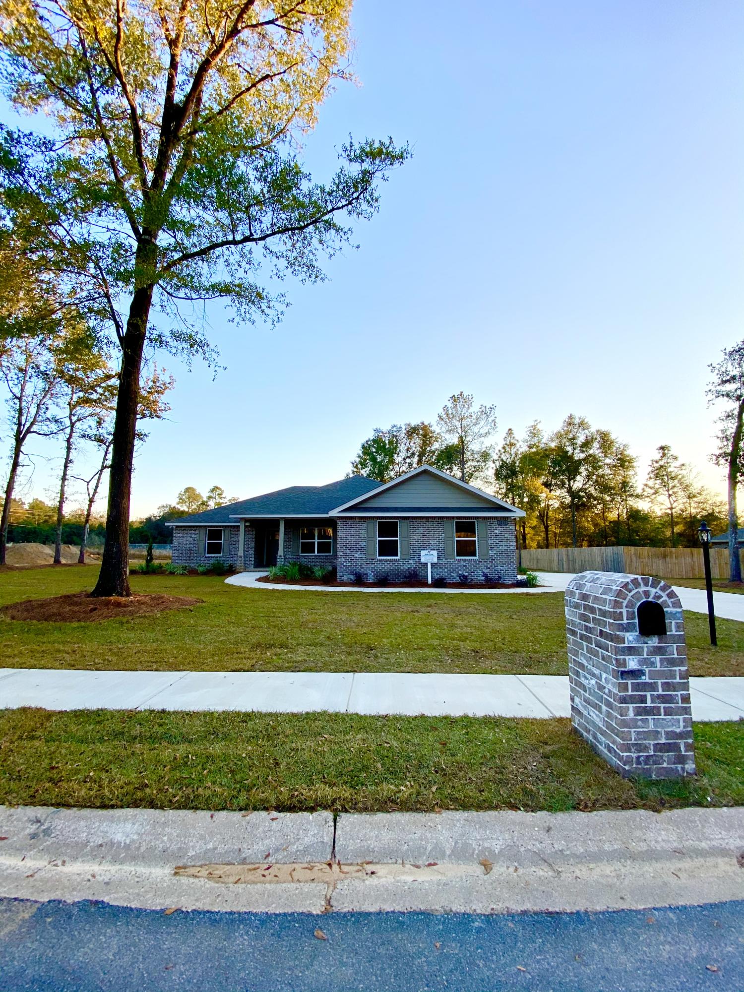 New construction! Award winning Builder! Estimated Completion by 11/1/20. This quality built brick home features a flat level lot, 4 bedrooms and 2 full baths, an open concept split bedroom design, side entry garage and beautiful finishes! You'll love the custom white shaker cabinetry and quartz tops throughout. Even the laundry features built in cabinetry! The yard will be fully sodded with irrigation system. Low E windows for energy efficiency, tray ceiling with crown molding  in the master bedroom. Located in the peaceful community of Lake Arthur Estates which offers residents a playground, basketball court, and beautiful lake to enjoy! Put this home on the top of your MUST SEE list and get it before its gone!